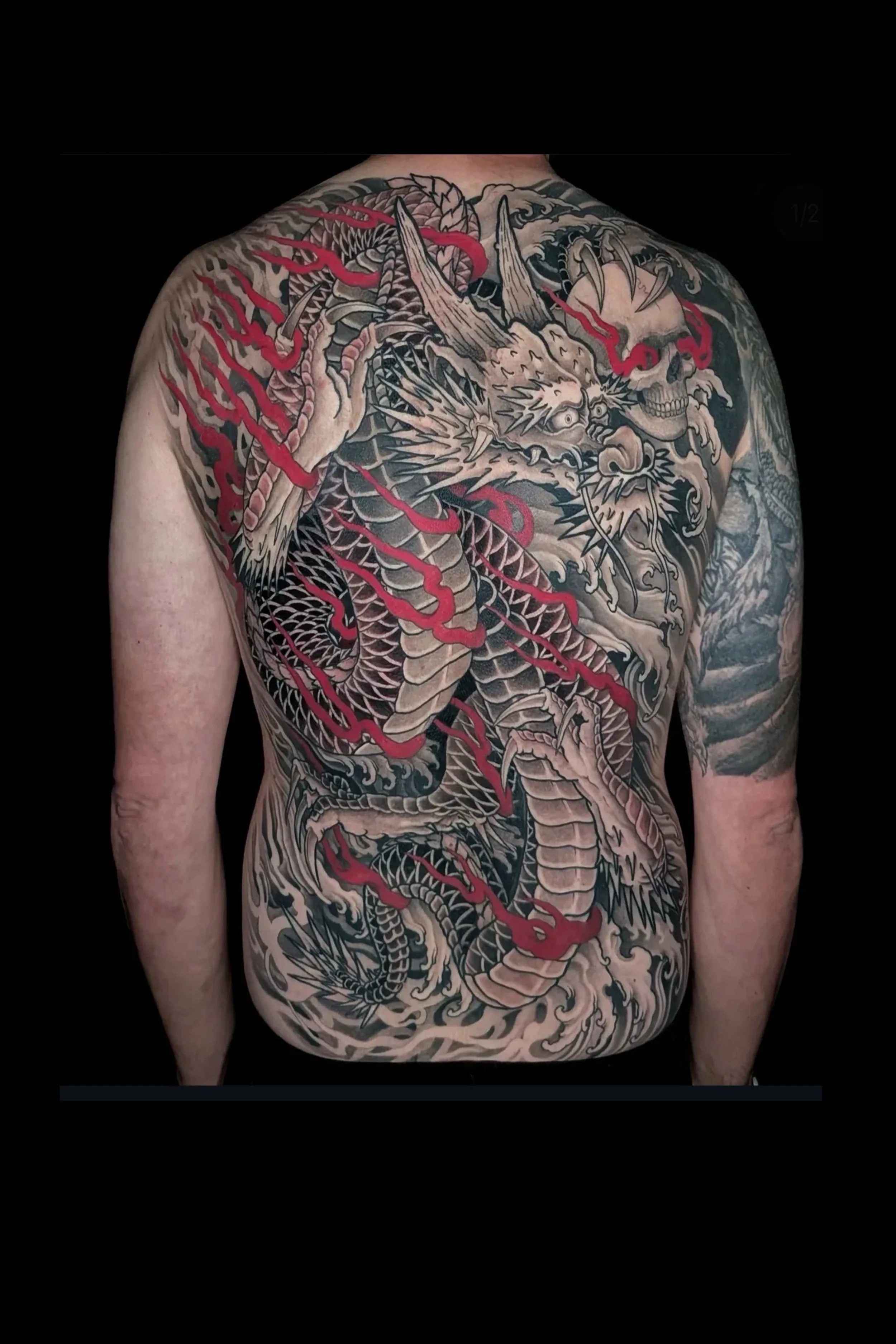 Black and grey dragon back piece by Zach Yokoyama