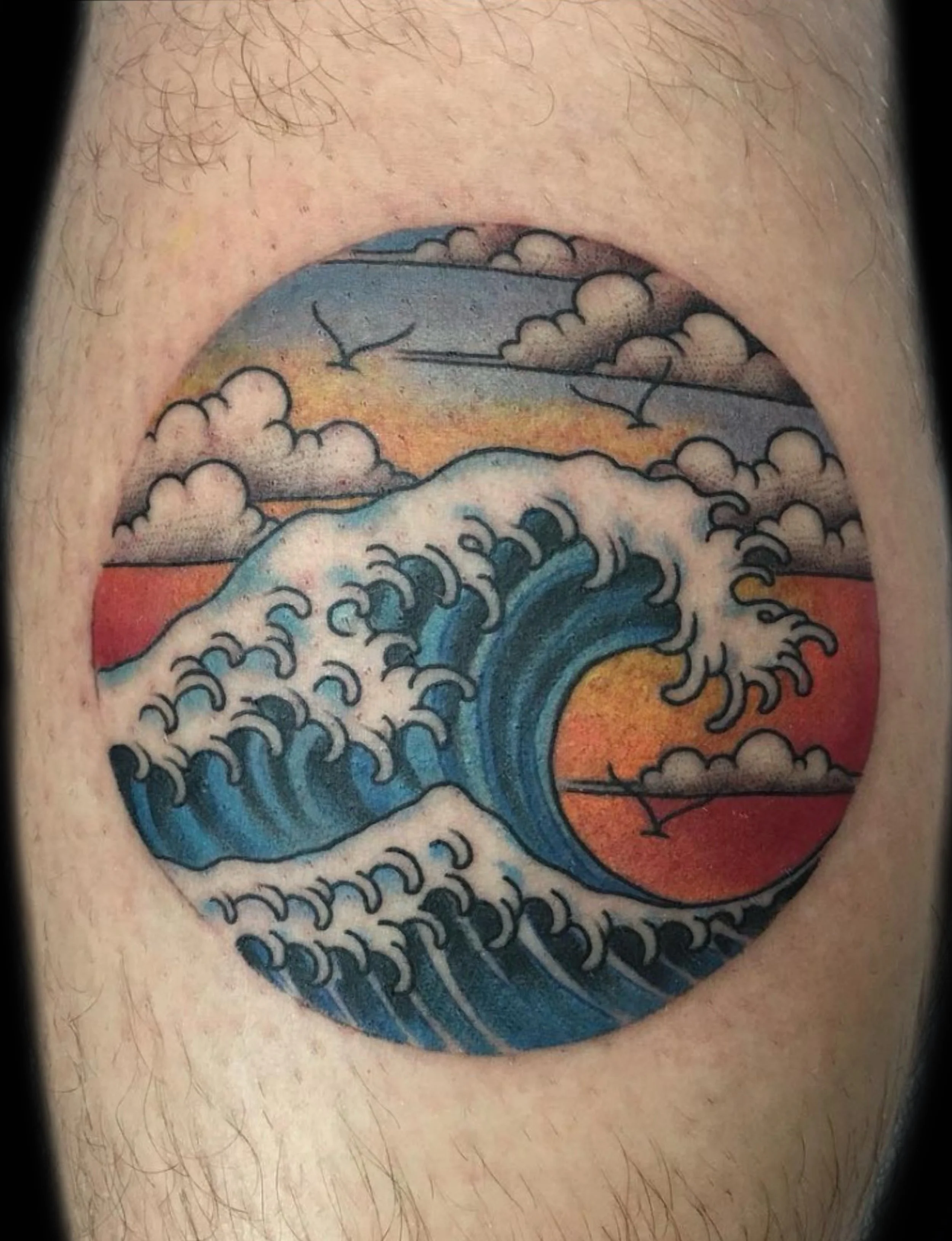 Traditional wave tattoo by Sue Kidder
