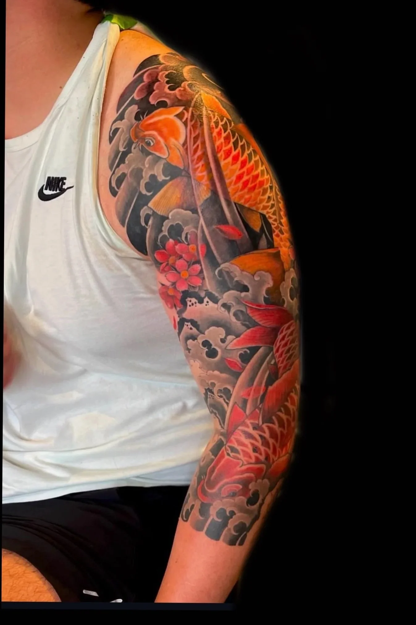 Japanese tattoo of a koi fish by Marie Makowski