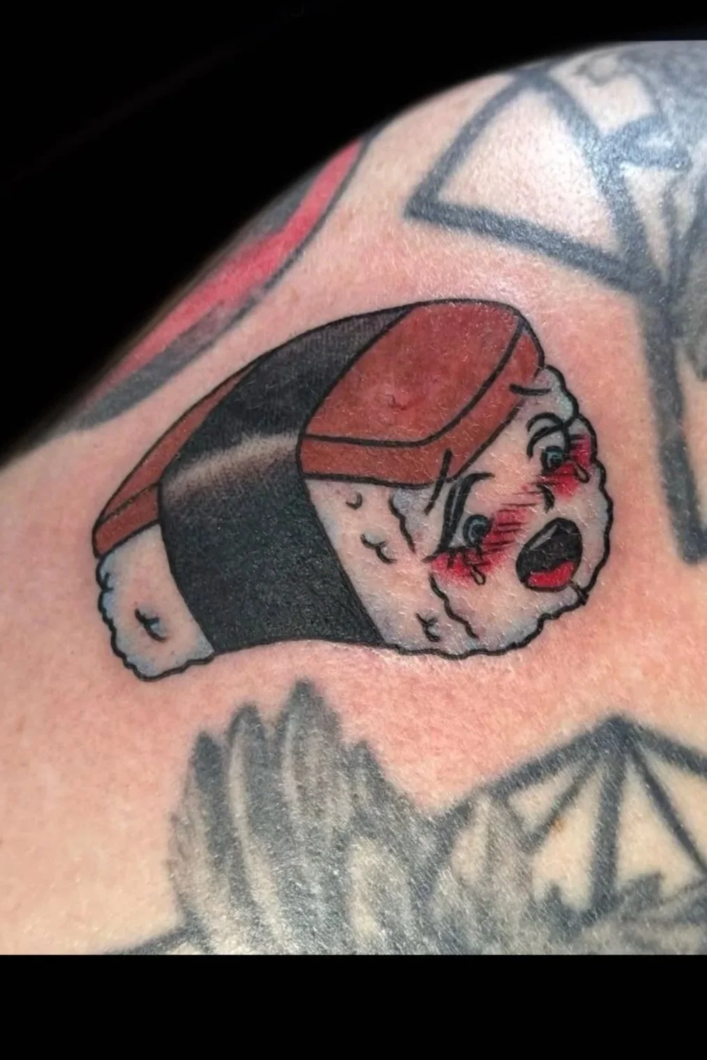Tattoo of musubi by Sue Kidder