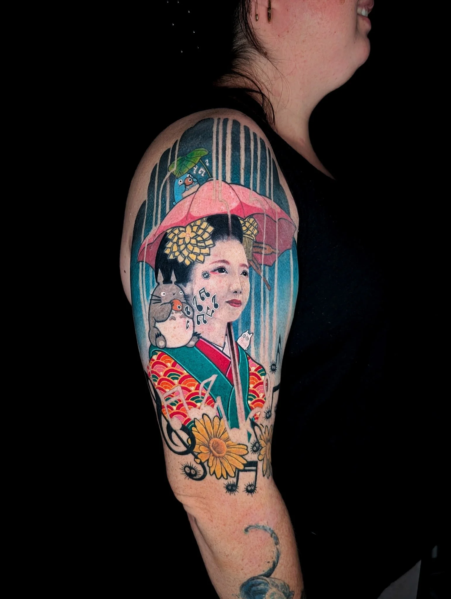 Japanese tattoo of a geisha under an umbrella in color done by Zach Yokoyama