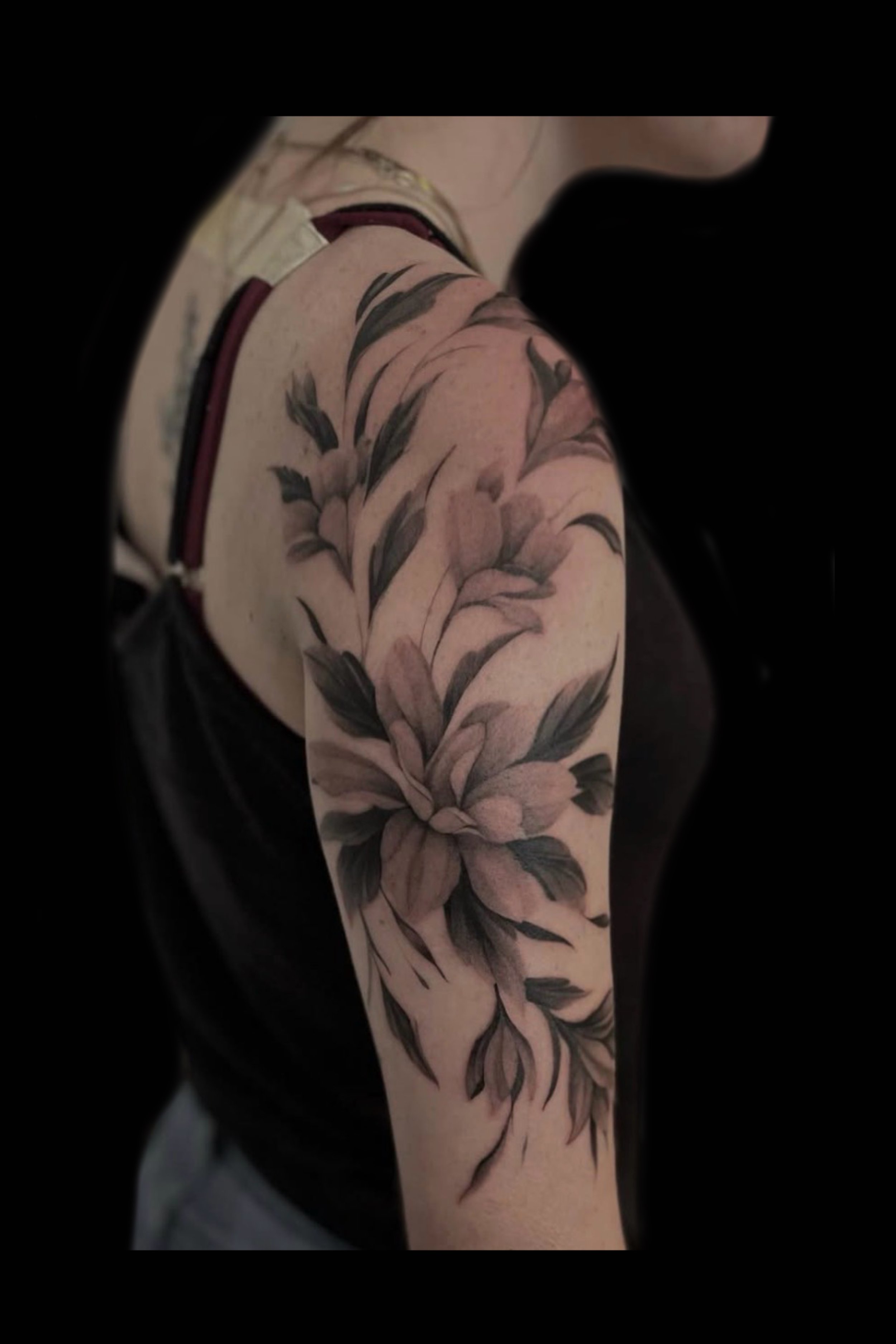 Soft black and grey flowers done by Marie Makowski