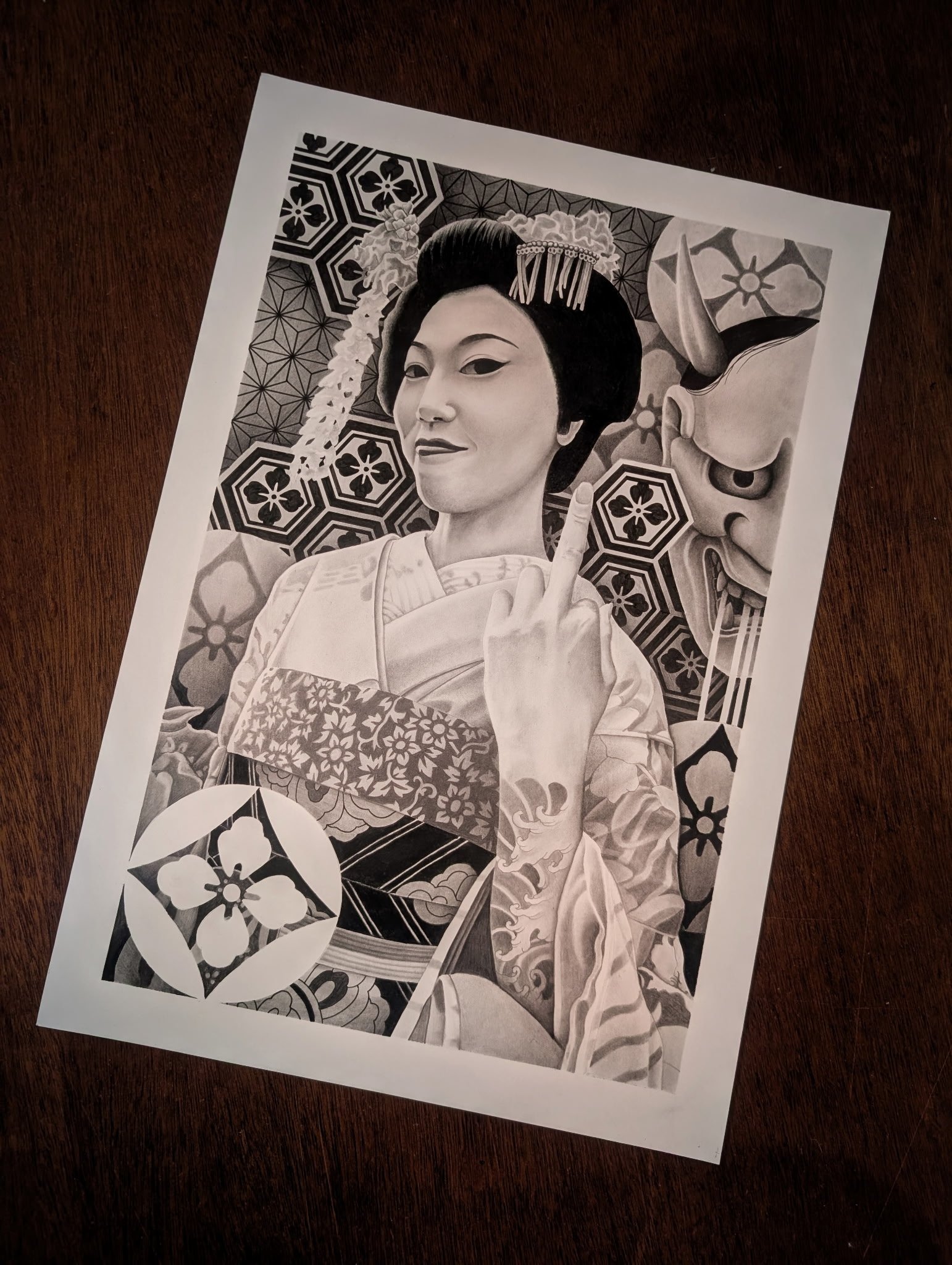 graphite drawing of a geisha flipping us off