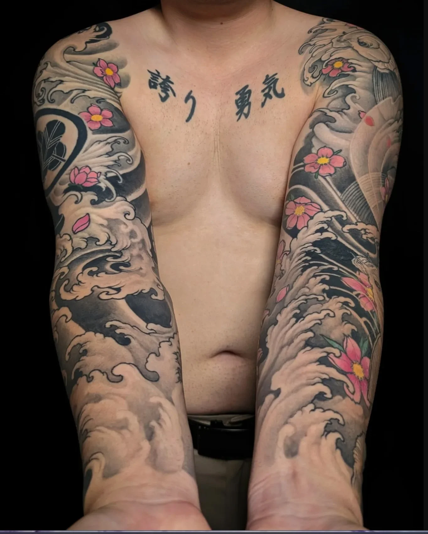 Japanese-sleeve-tattoo-water-and-flowers-by-Zach-Yokoyama.jpg