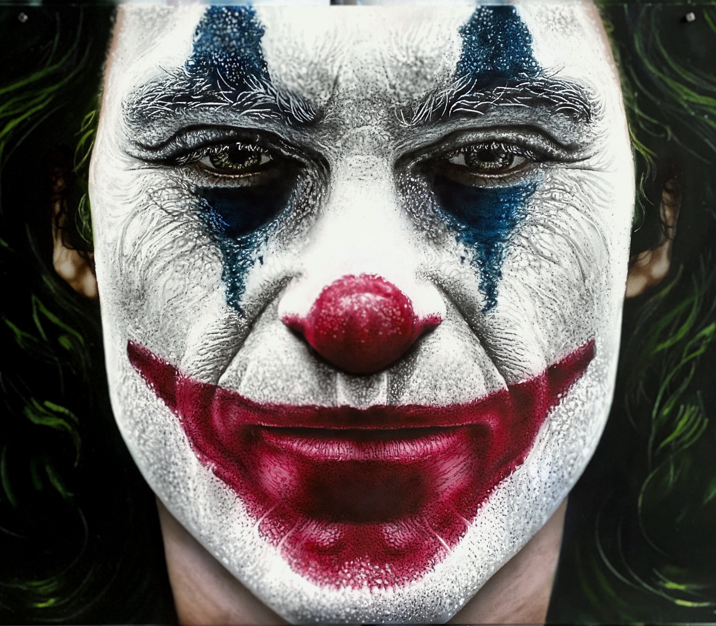 the joker portrait painted in acrylics airbrushed by Richie Lucero