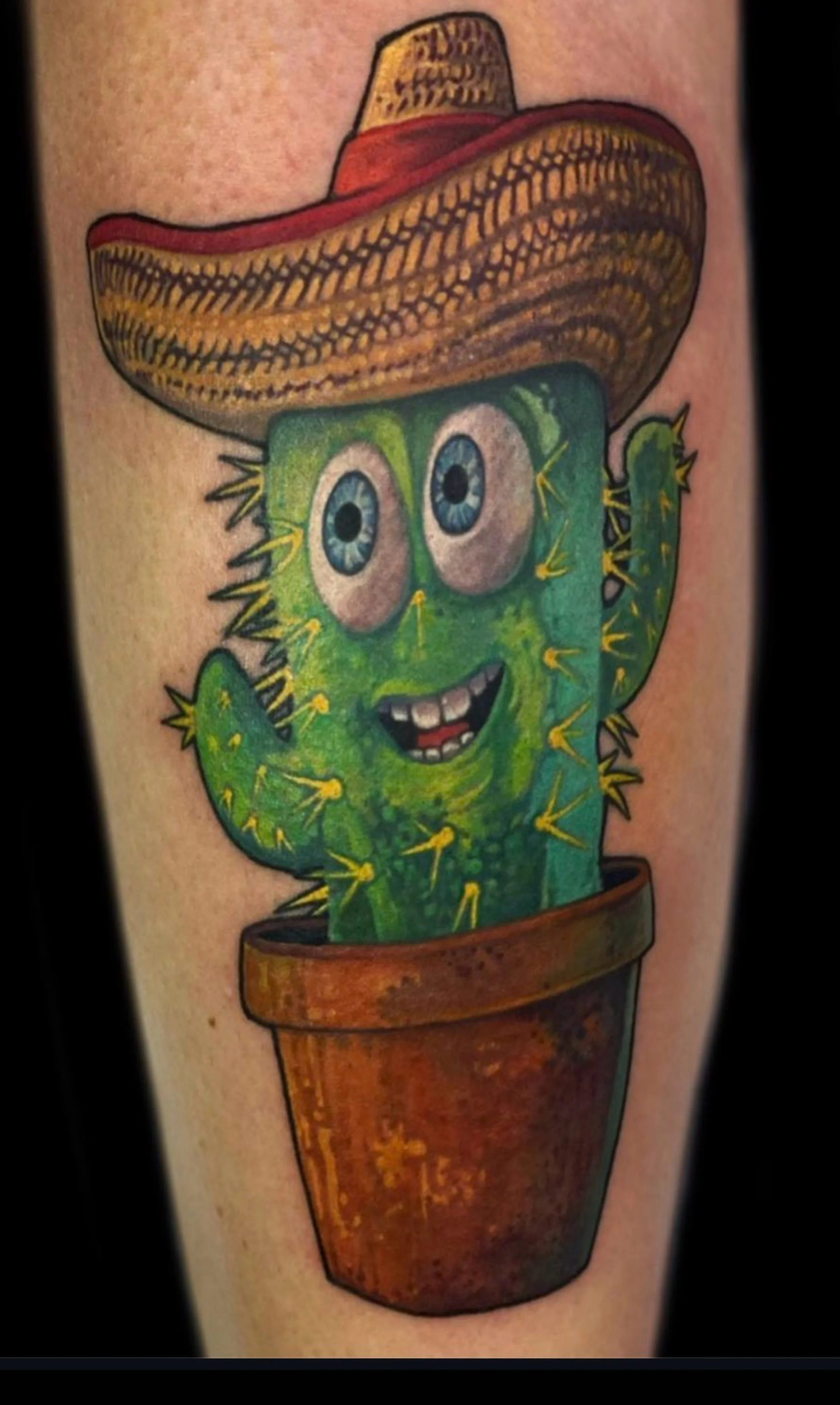 Colorful tattoo of a happy cactus by Richie Lucero