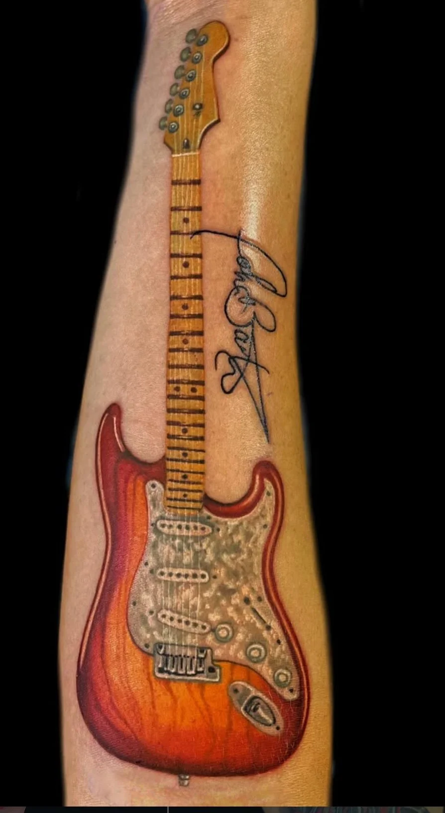 Guitar-tattoo-by-Richie-Lucero.jpg