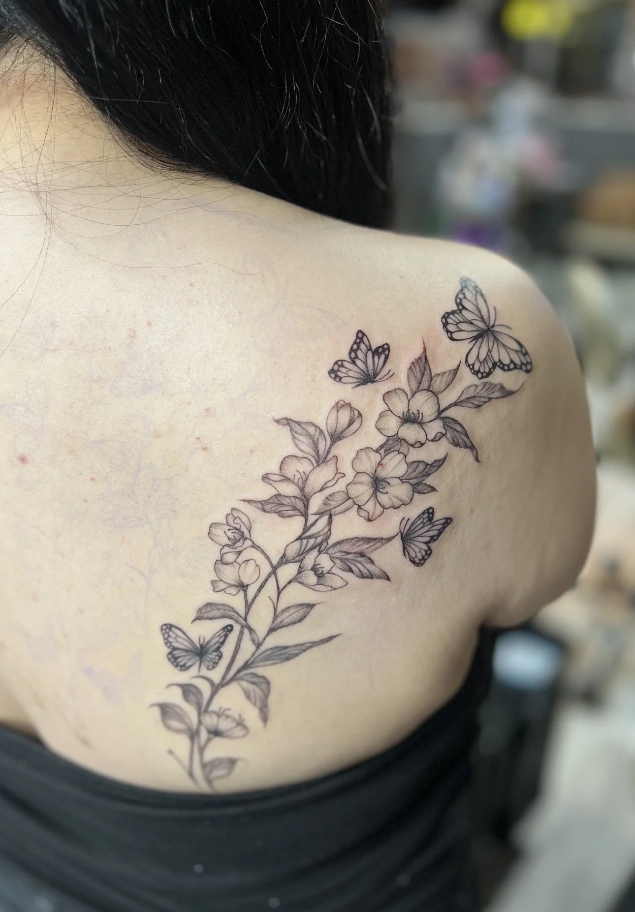 fine-line florals and butterflies tattoo by Telley