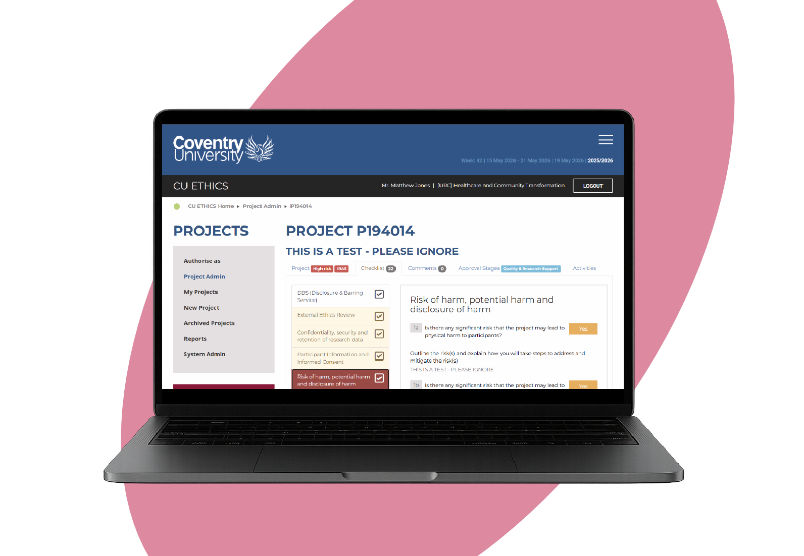 Laptop displaying Coventry University online project management platform with project details related to ethics and risk of harm, set against a pink abstract background.