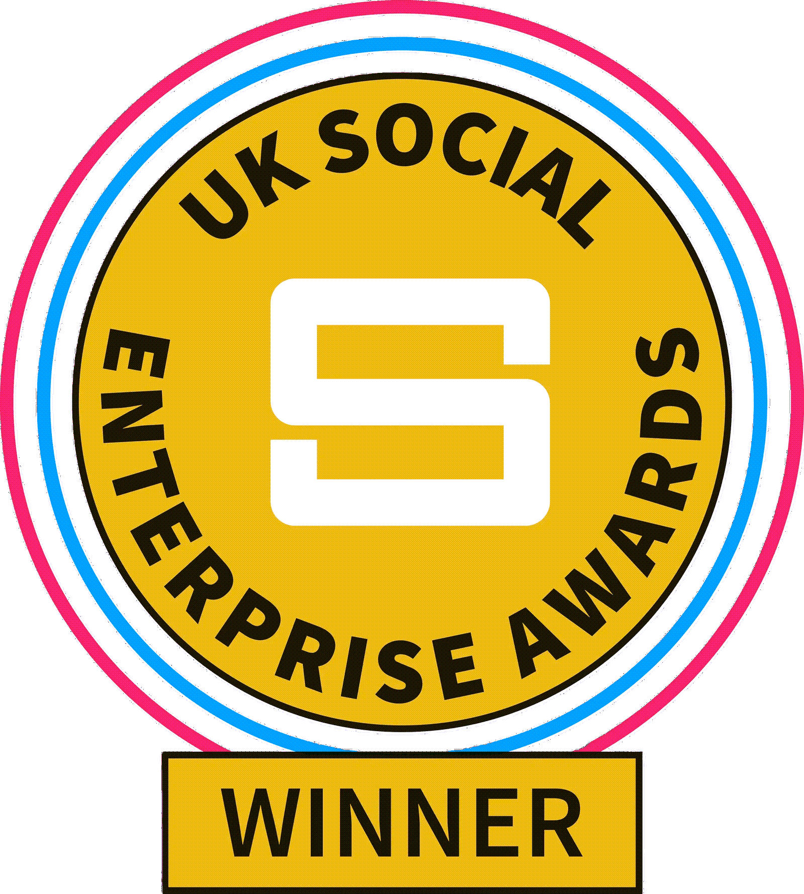 A circular award badge with a white, red, and blue border. Inside, a gold circle contains the text 'UK SOCIAL ENTERPRISE AWARD' around the large center letter 'S'. Below the badge, a rectangular yellow plaque with black text reads 'WINNER'.