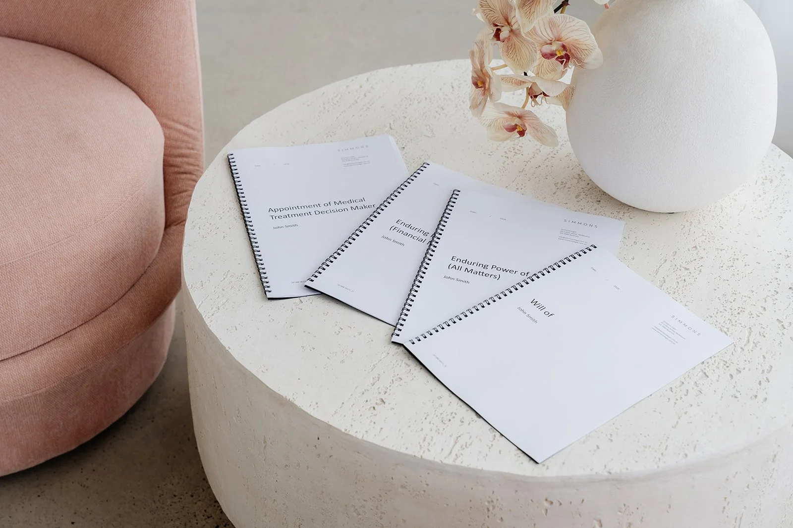 A table with estate planning documents, representing fixed-fee Will services in Melbourne Victoria