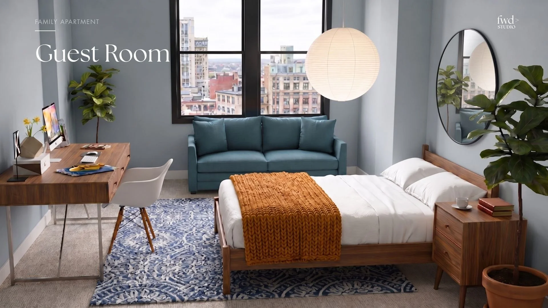 A cozy hotel guest room with a bed, side table, green couch, desk with computer, large window with city view, and decorative plants.