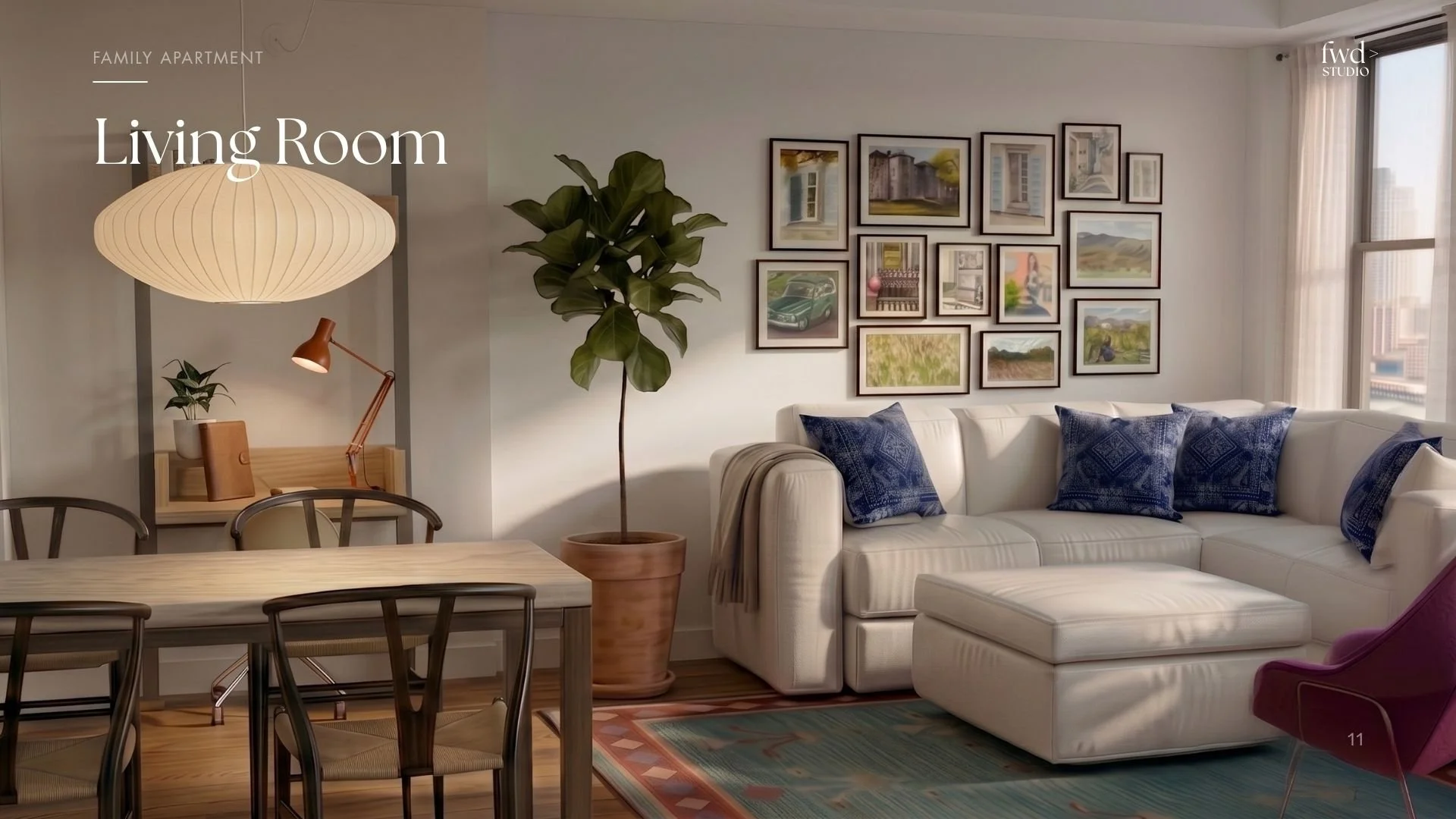 Living room with a white sofa with blue pillows, large window with curtains, framed pictures on the wall, a large potted plant, a dining table with chairs, and a standing lamp with a shade.