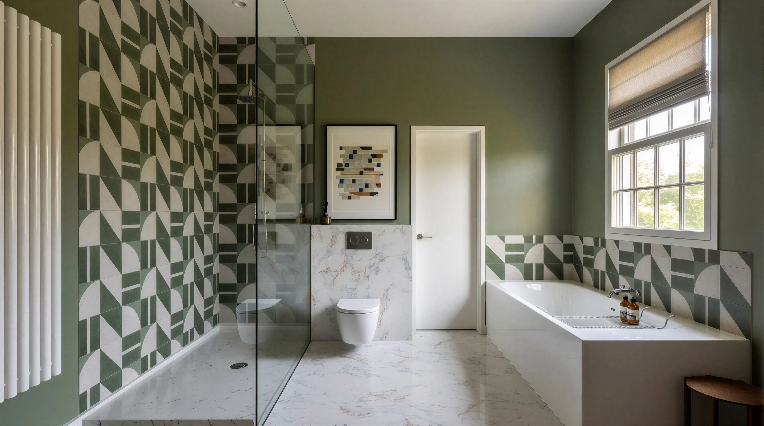 Modern bathroom with green and geometric patterned tiles, a walk-in shower with a glass wall, a white toilet, a marble backsplash, artwork on the wall, a bathtub under a window with blinds, and a small wooden stool in the corner.