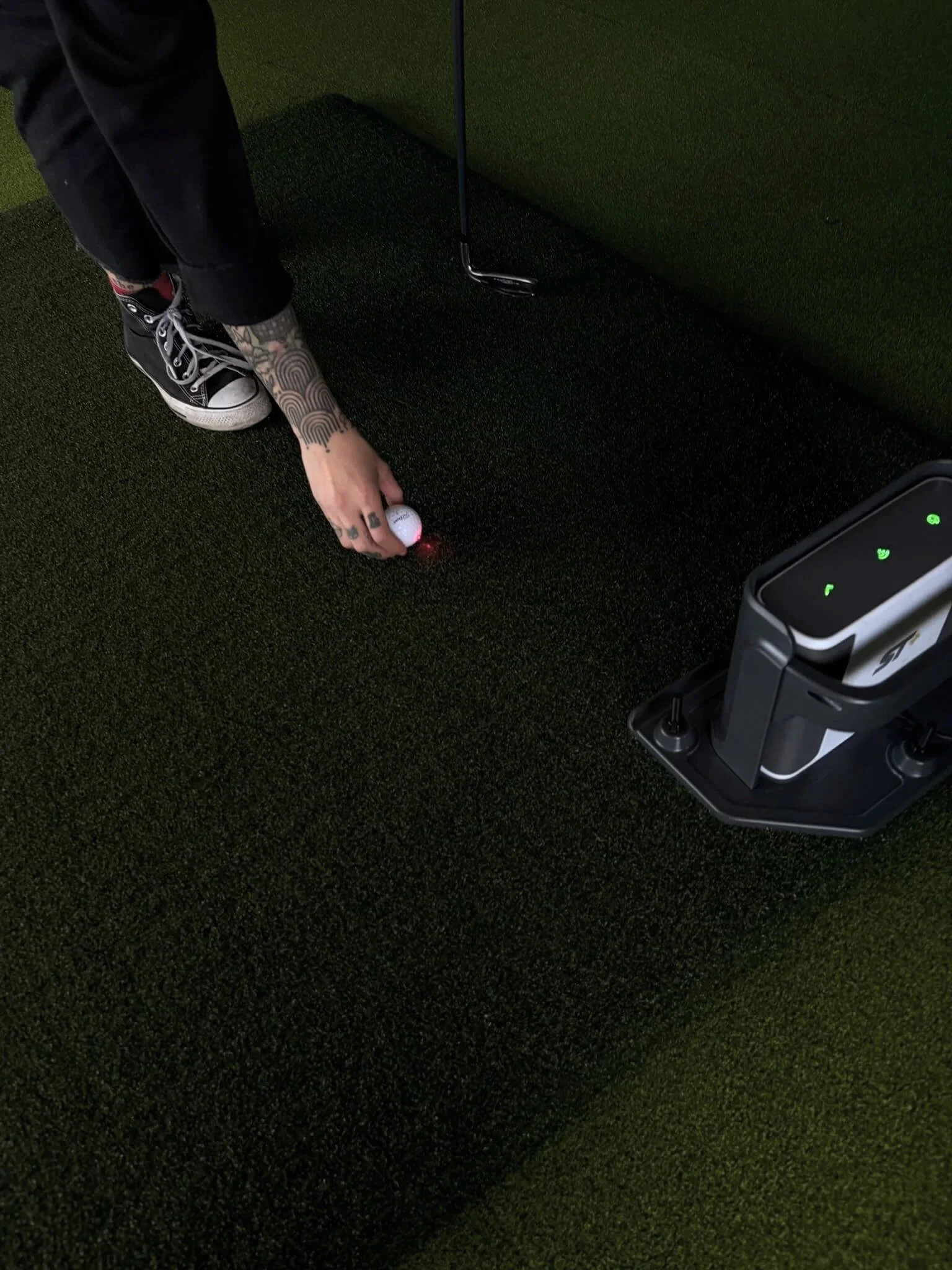 Guest setting up at the Lemont Golf mobile simulator during a Nashville event