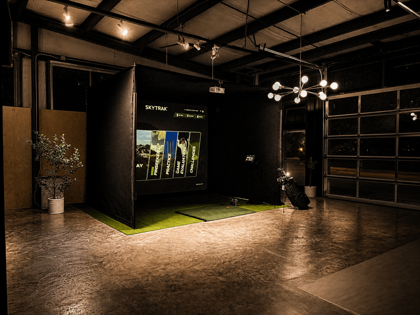 Lemont Golf mobile golf simulator setup inside a Nashville event venue with modern lighting and turf
