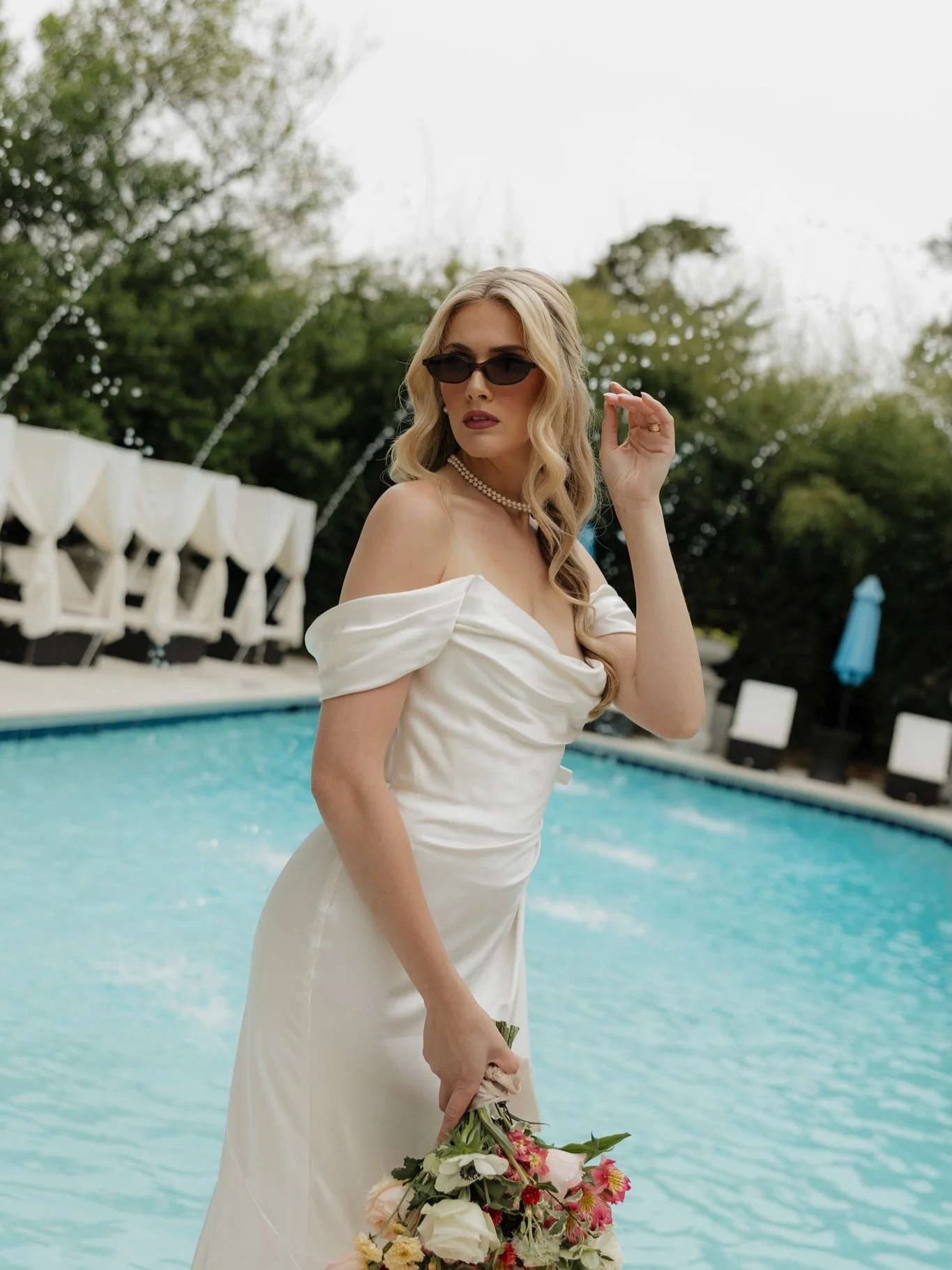 Pool side bridal Barbie in real life 👛

Concept @riannhassell 
Coordinating @gracie.tryggestad 
Hair @bellesbrides 
Makeup @tiffanimachellemakeup 
Dress @lamariee_boutique 
Venue @mcfarlinmansion 
Model @madelinegraceperry 
Florals @okiefloralco