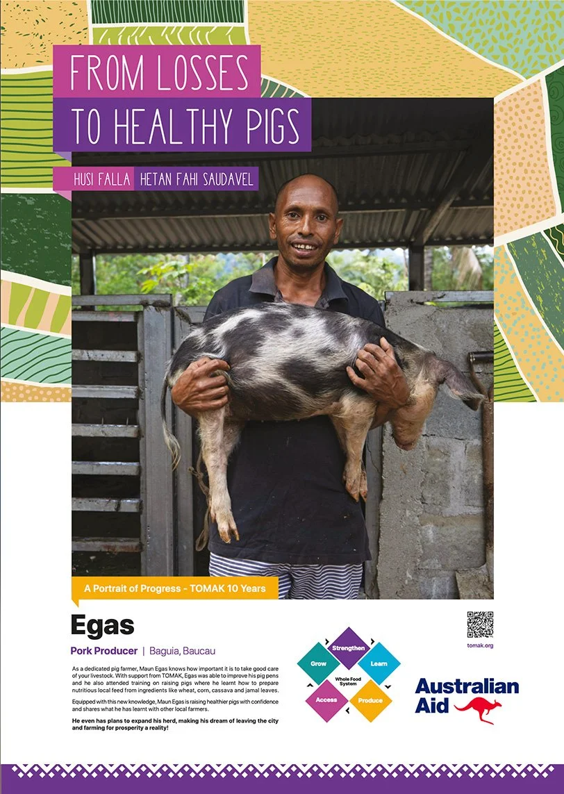 Man holding a pig in a farm setting, promoting pig health and progress.