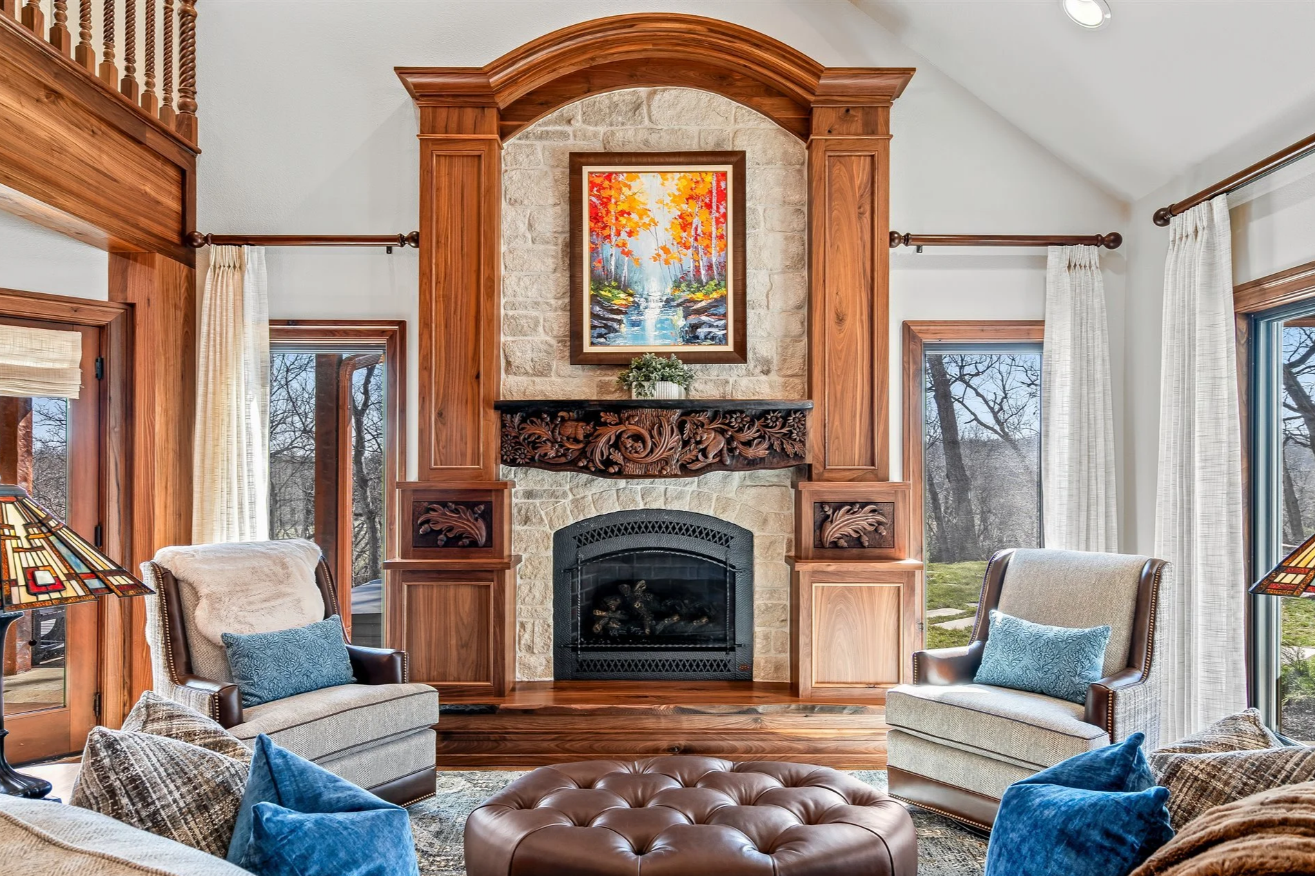 The Lookout Cottage living room features a cozy gas fireplace and social seating.