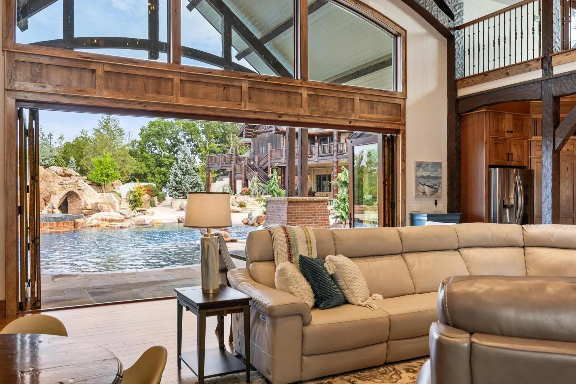The Pool House living room offers guests an indoor/outdoor experience.