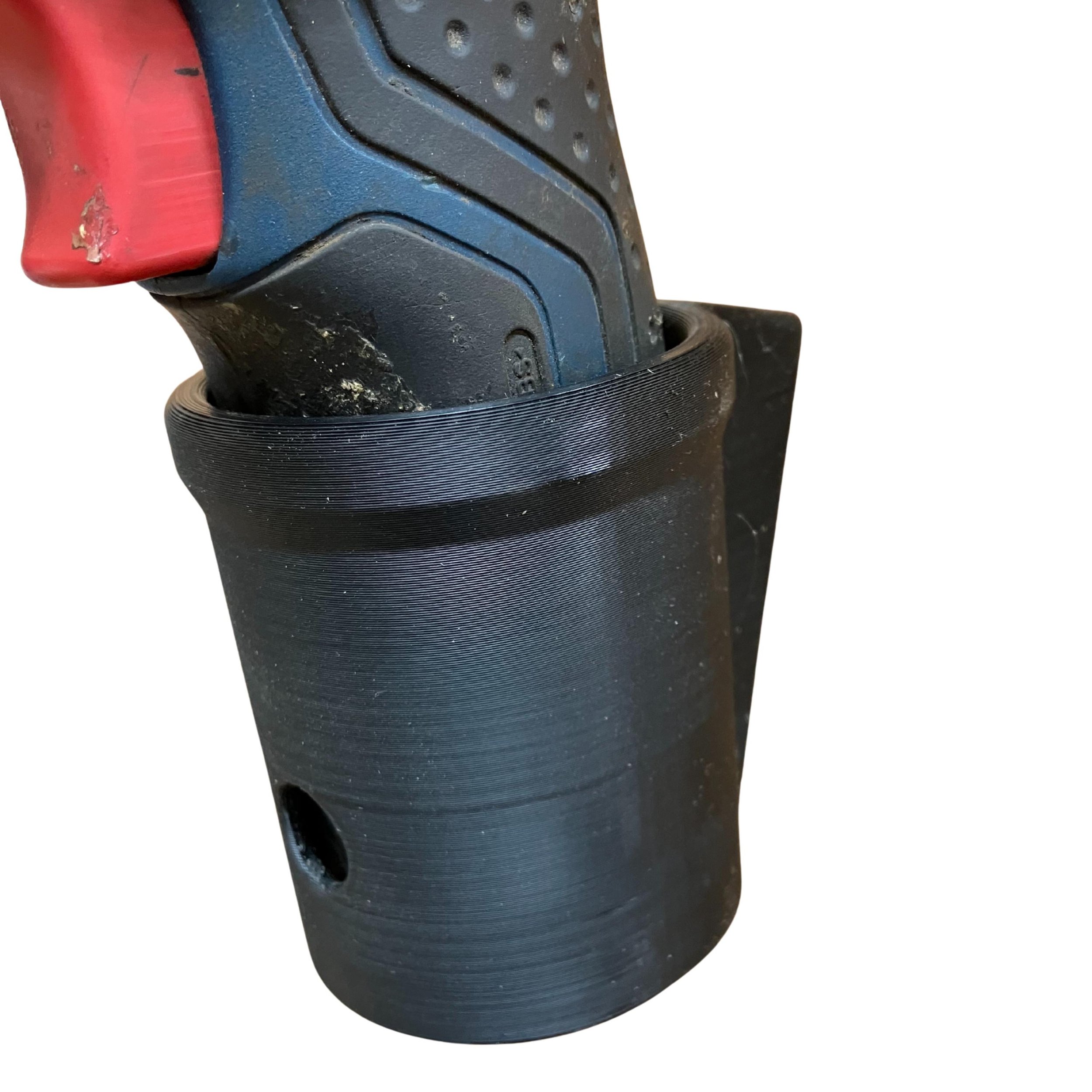 Bosch 12V drill handle seated in the black wall mount holder