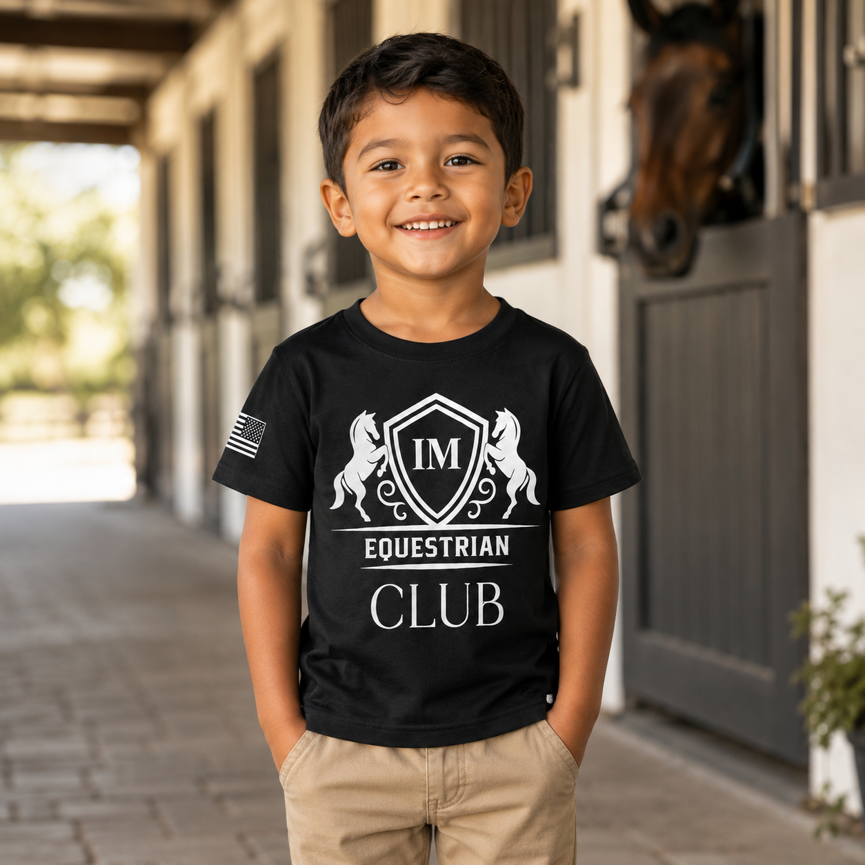 Boy wearing youth screen printed T-shirt.png