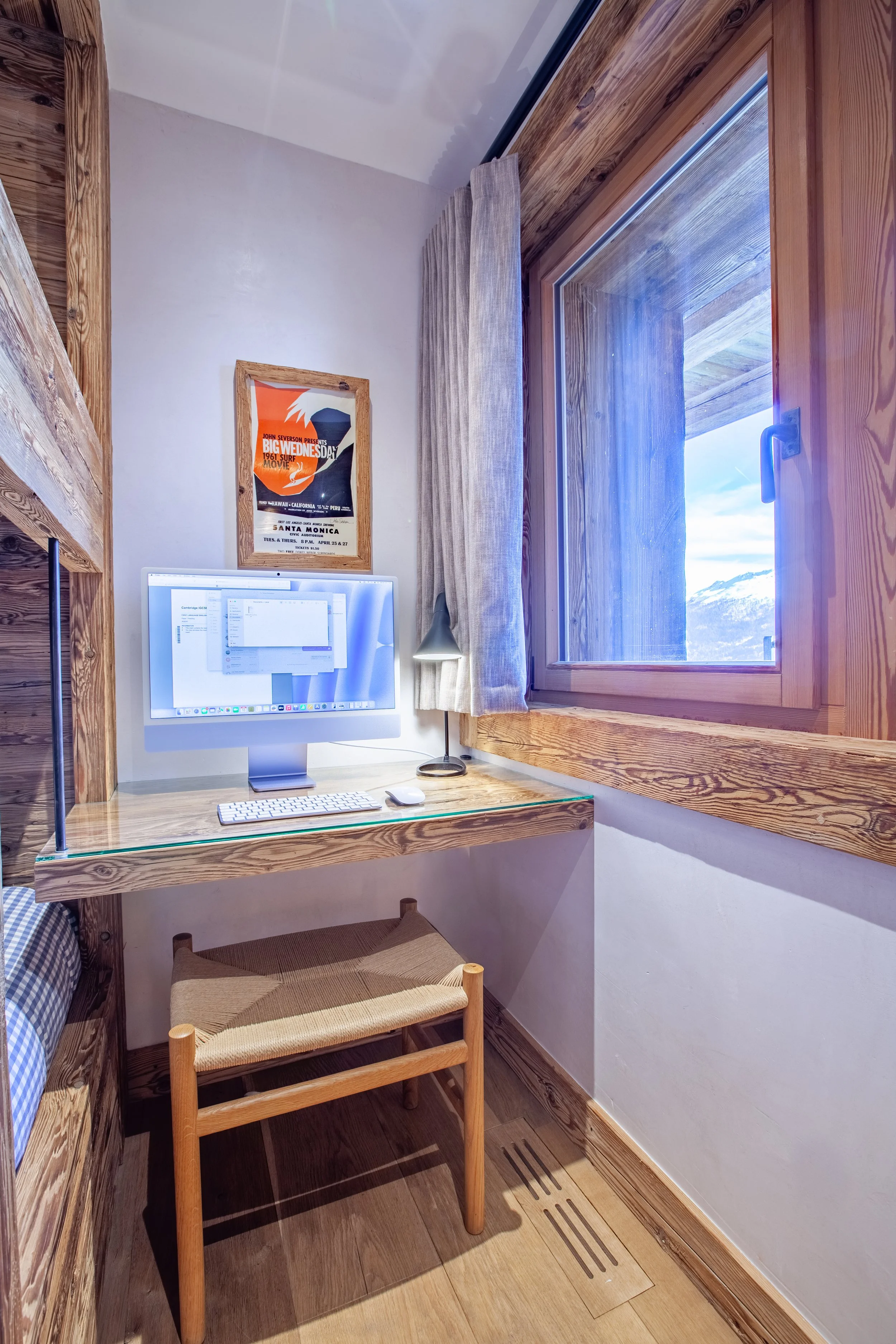Study area with Mac computer and Alpine mountain views, Chalet la Vigne Verbier — ideal for remote working or exam preparation