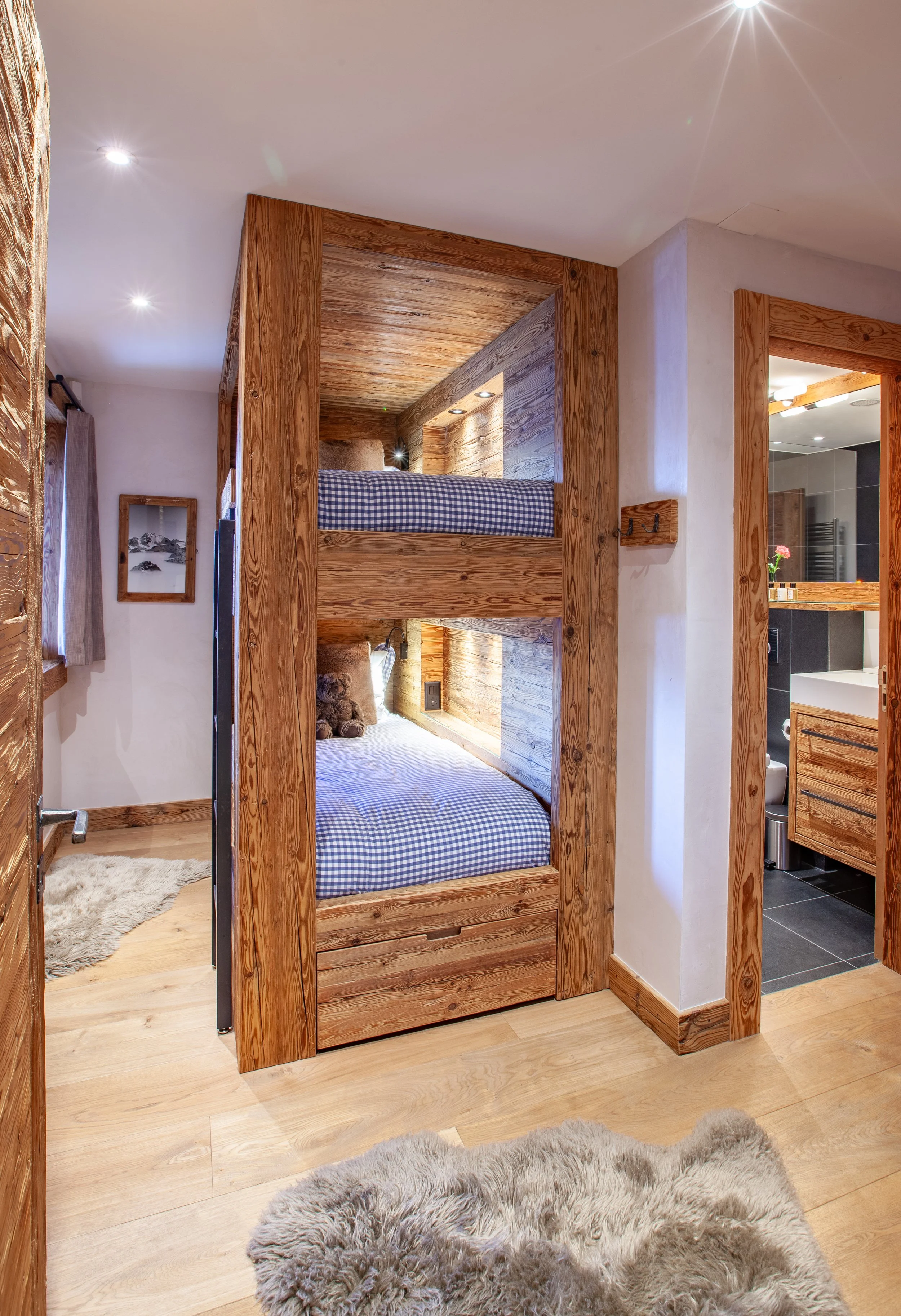 Bunk room with traditional Swiss wooden bunks sleeping four, Chalet la Vigne Verbier Switzerland