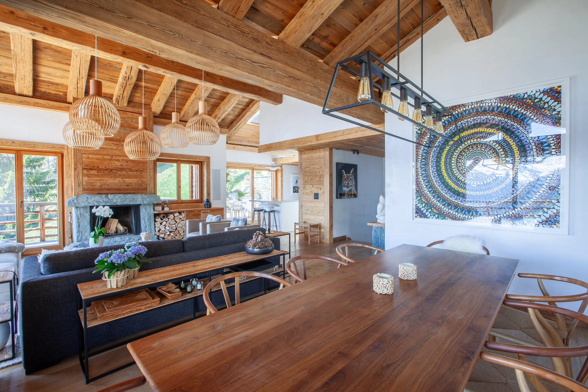 Open plan dining area with rustic Swiss mountain chalet interior, Chalet la Vigne Verbier Switzerland