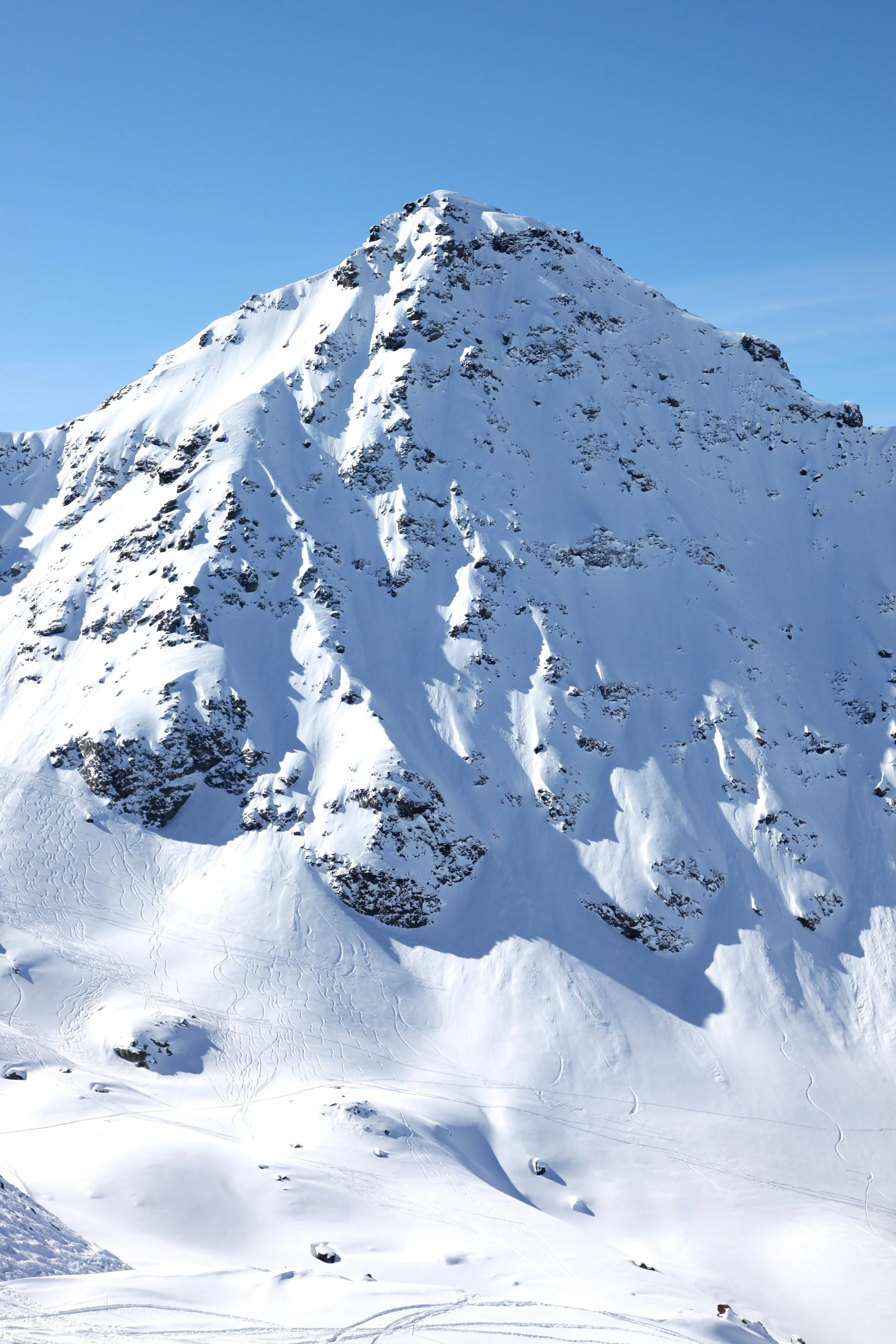 Bec des Rosses dogleg couloir on a powder day, Verbier Switzerland