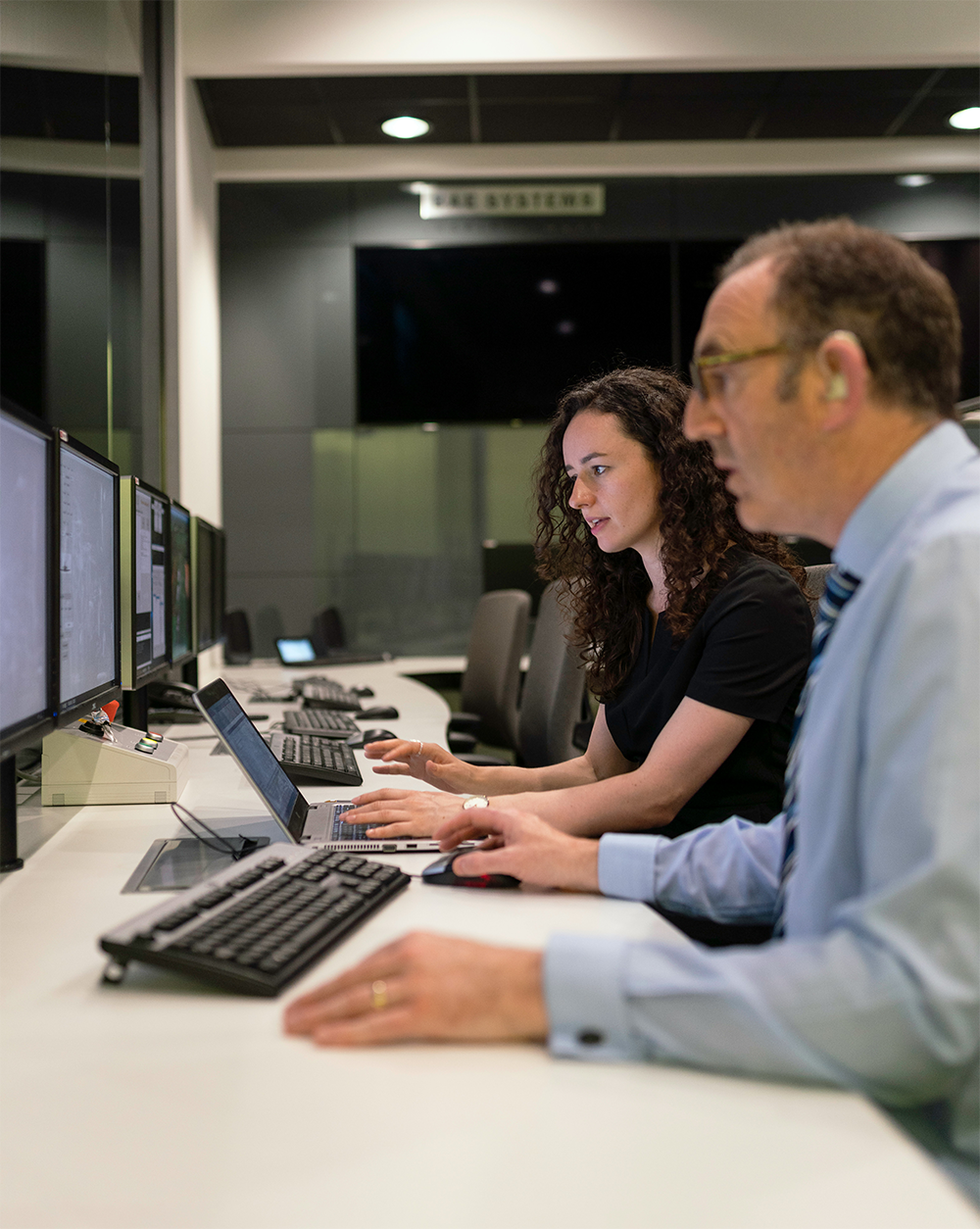 Technical workers collaborating in an office