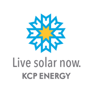 A blue snowflake with a yellow star in the center, and the text "Live solar now. KCP ENERGY" below.
