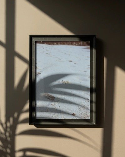 contemporary-frame-mockup-showing-design-ideas-with-subtle-light-shadow-play-on-wall-background-0646 (1).jpg
