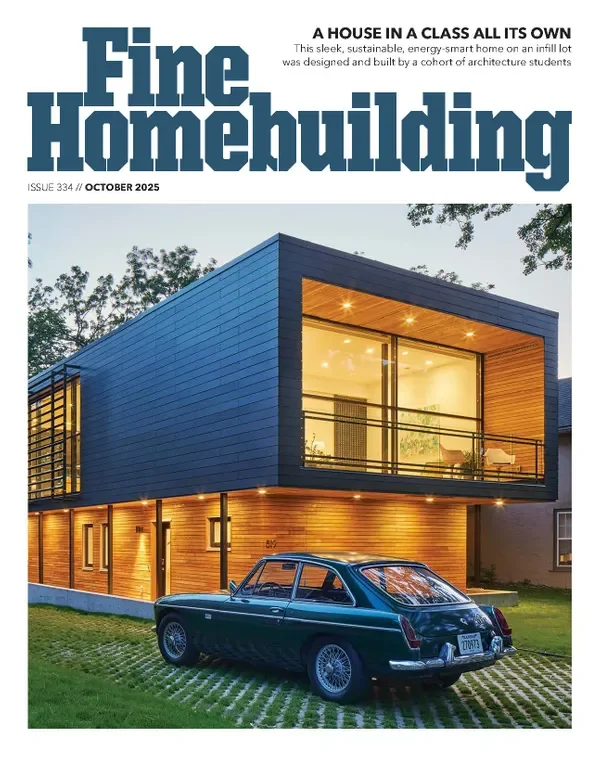 Modern two-story house with a sleek black exterior and large glass windows, illuminated from within, parked on a grassy area with a classic dark blue car in front.