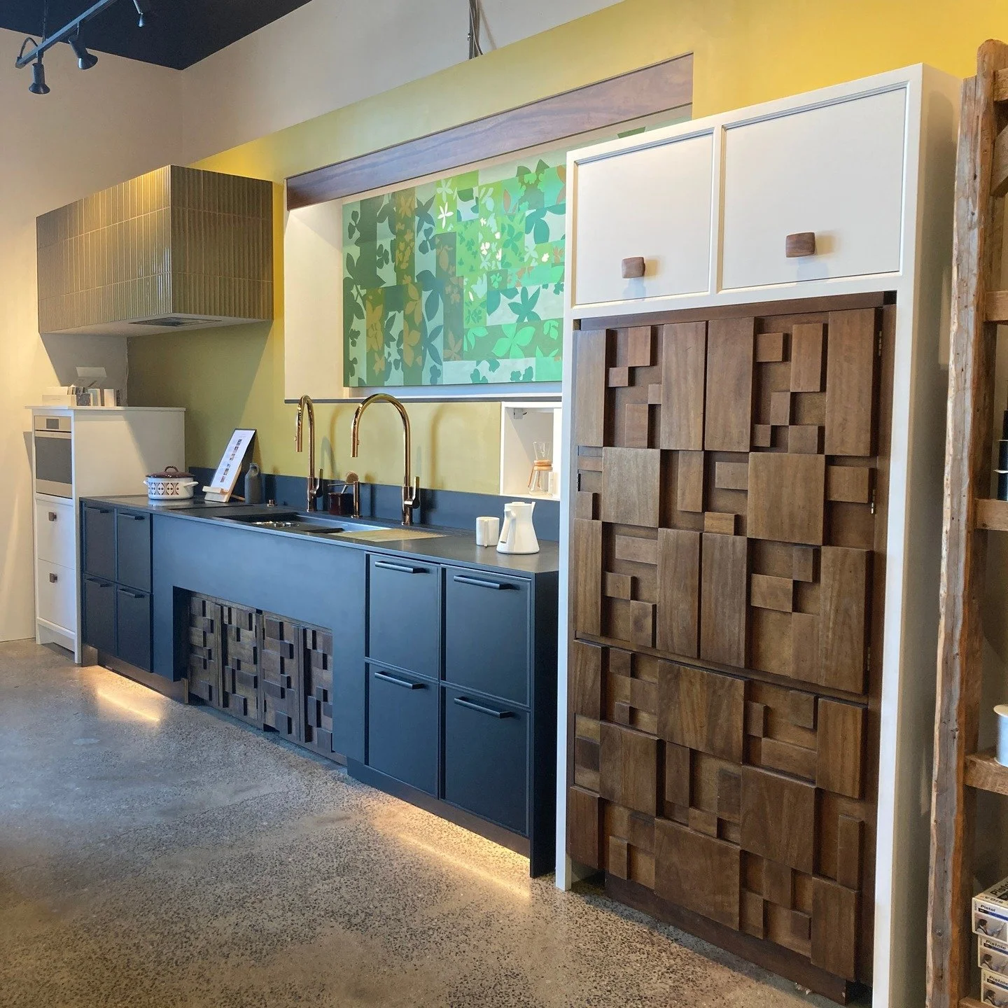 This showroom display isn't for everyone. And that's OK. This display is a beginning, a self-imposed push outside my comfort zone to explore how kitchen designers can strive for better environmental outcomes. 

The 1970s pantry and the sink cabinet w