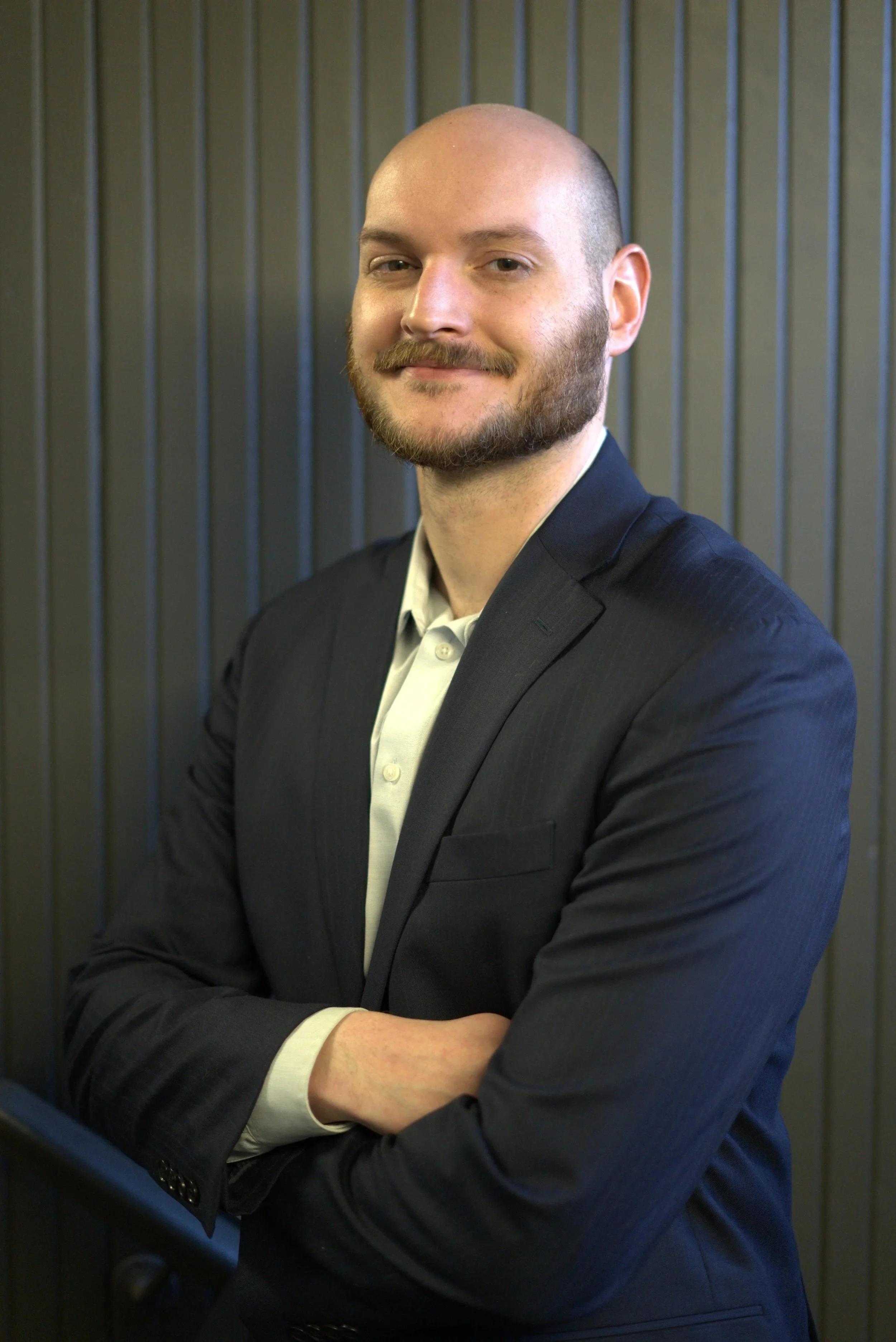 Democratic candidate standing against green background, Berks County Pennsylvania campaign image highlighting district 5 policy