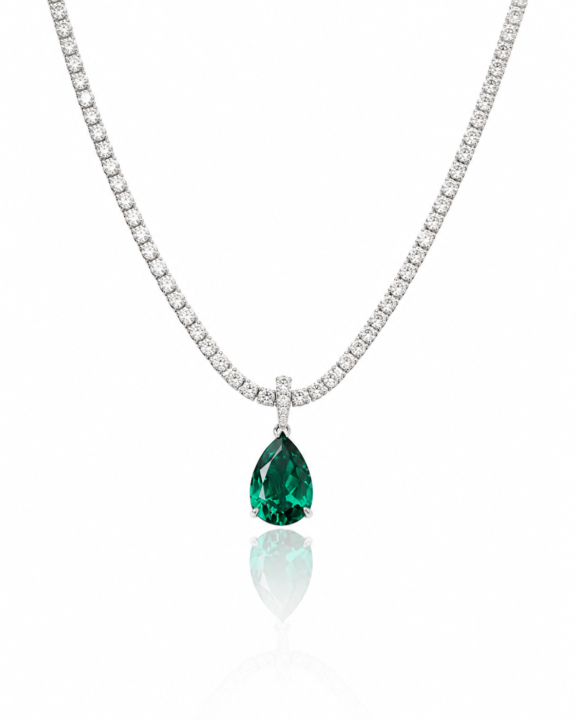 Silver necklace with a large teardrop-shaped green gemstone pendant surrounded by small clear stones