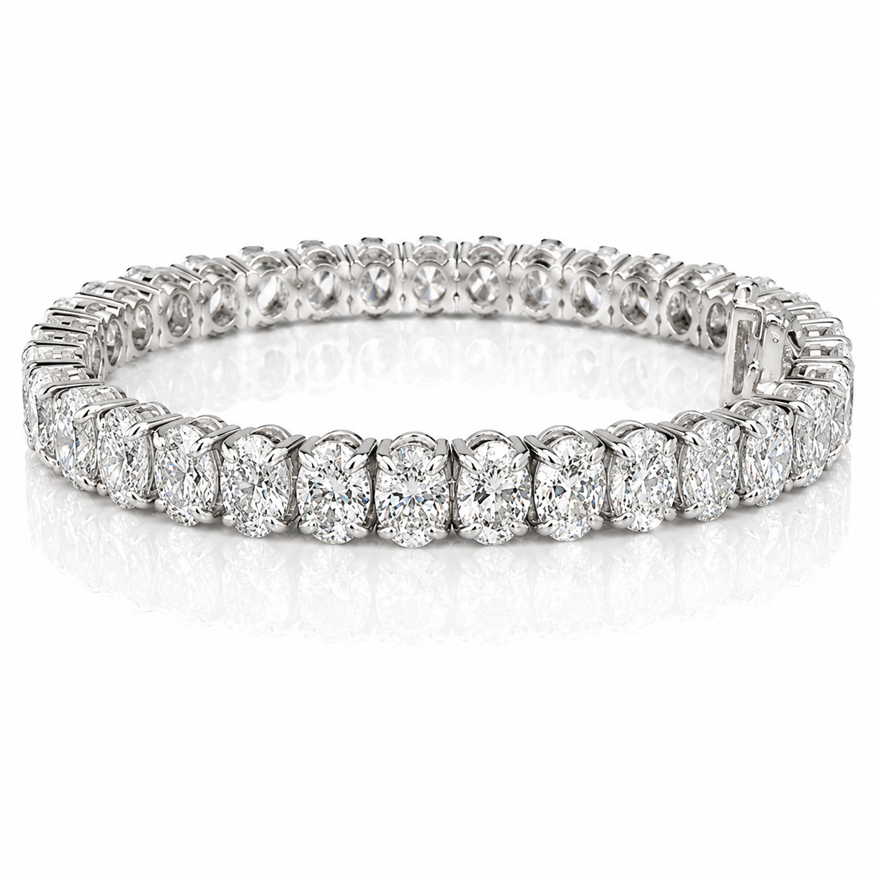 A diamond tennis bracelet with round-cut diamonds set in white gold.