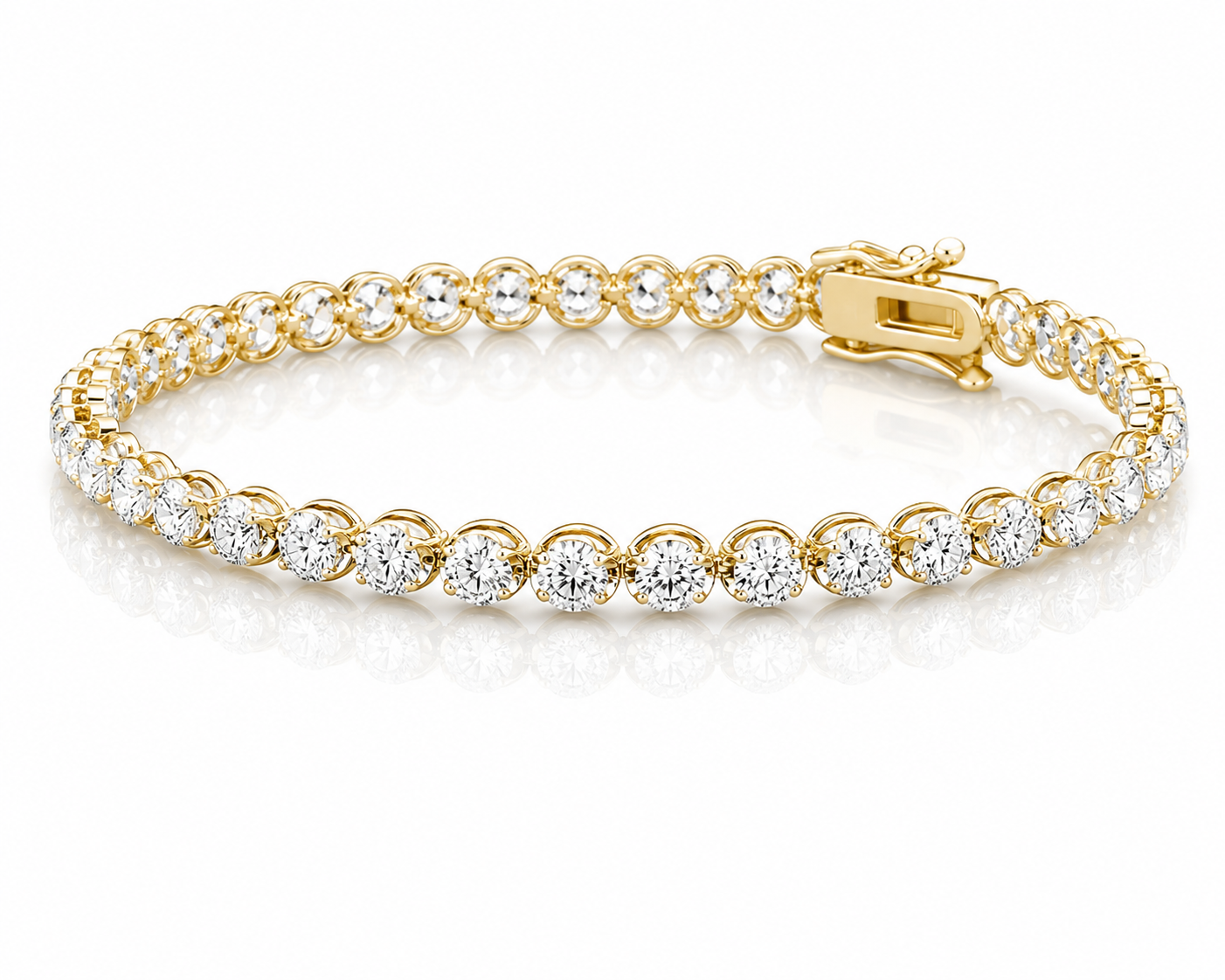 A gold bracelet with round-cut diamonds set in individual prongs, arranged in a continuous line, with a secure clasp mechanism, shiny and reflective.