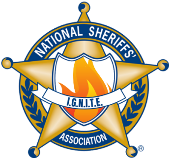 Logo of the National Sheriffs' Association I.G.N.I.T.E., featuring a star badge with a shield in the center and a banner at the bottom.
