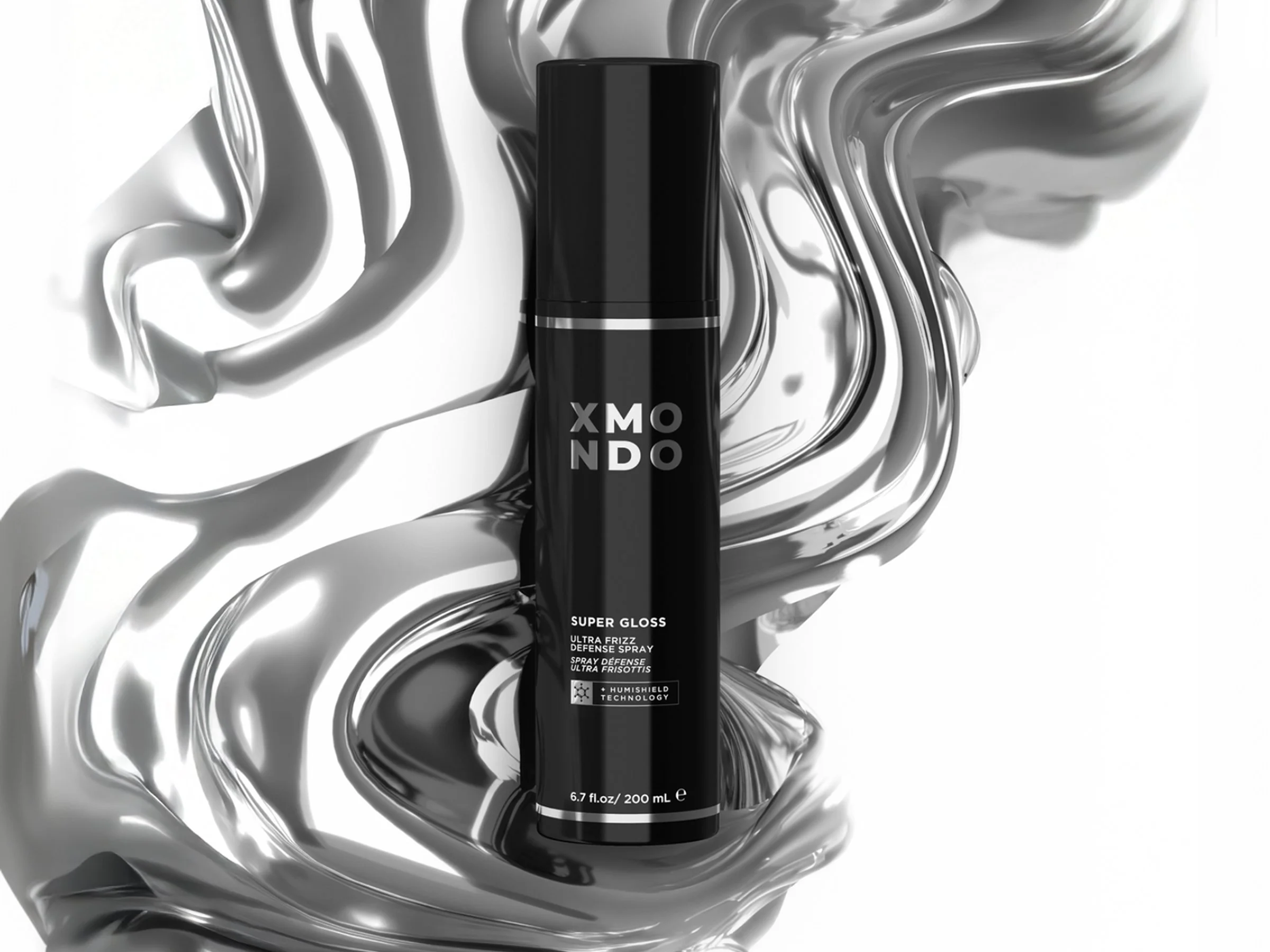 A black spray can with white text and a silver stripe, standing upright against a background of swirling silver metallic paint.