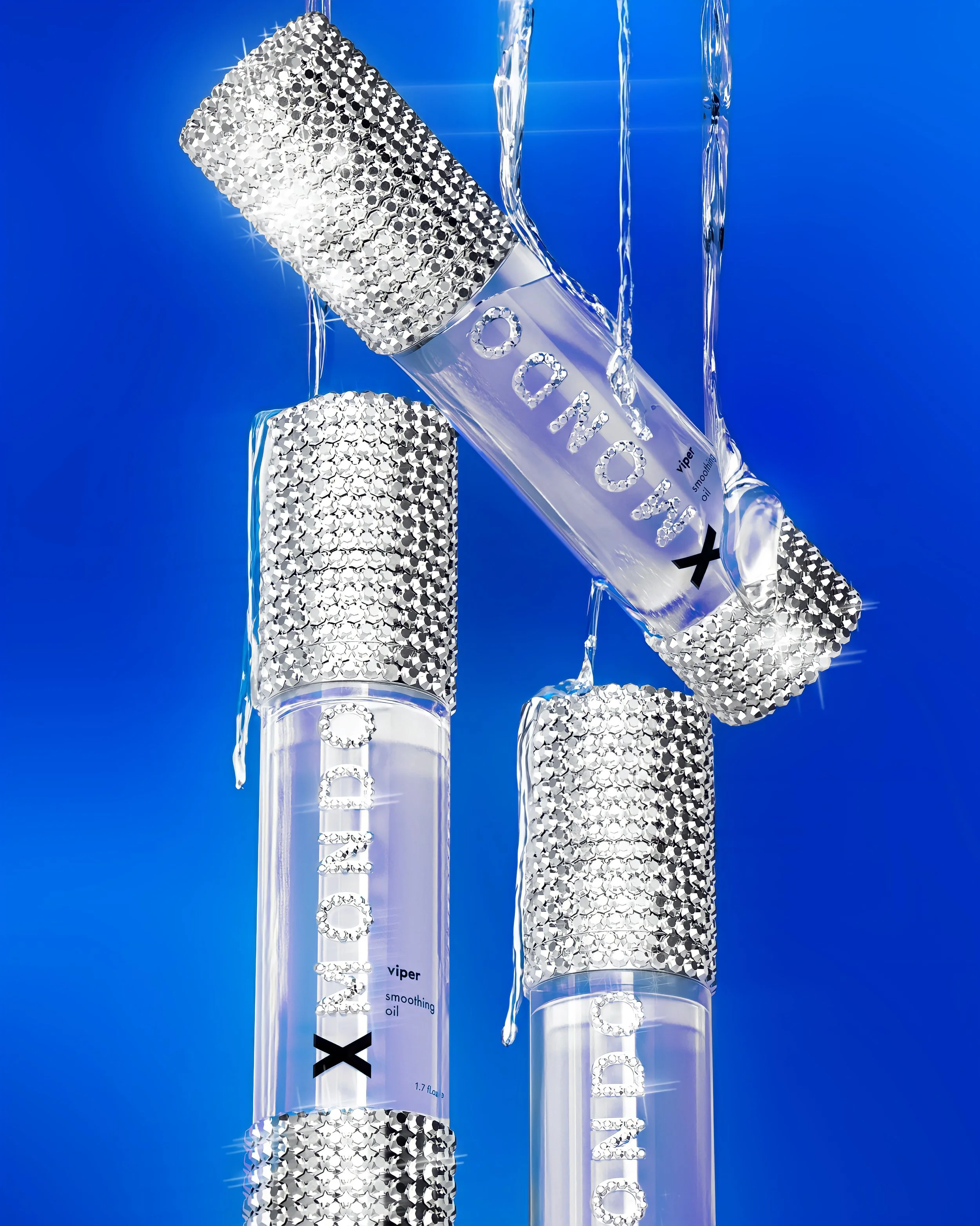 A transparent tube of Viper Smoothing Oil with a sparkly, textured cap, surrounded by flowing water droplets against a blue background.