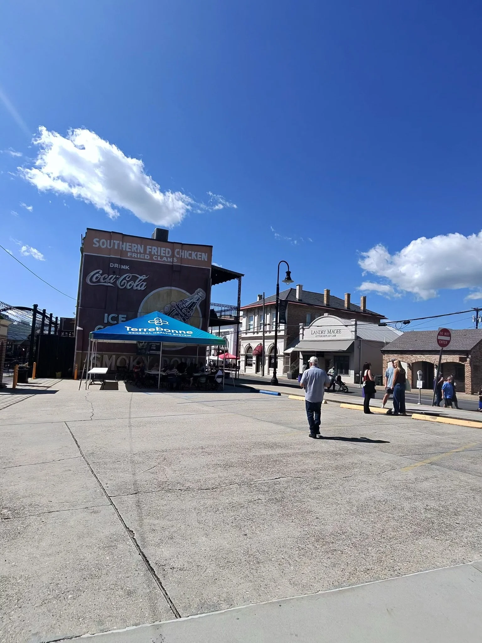 Bayou Arts Fest in downtown Houma by the vintage Coca-Cola mural