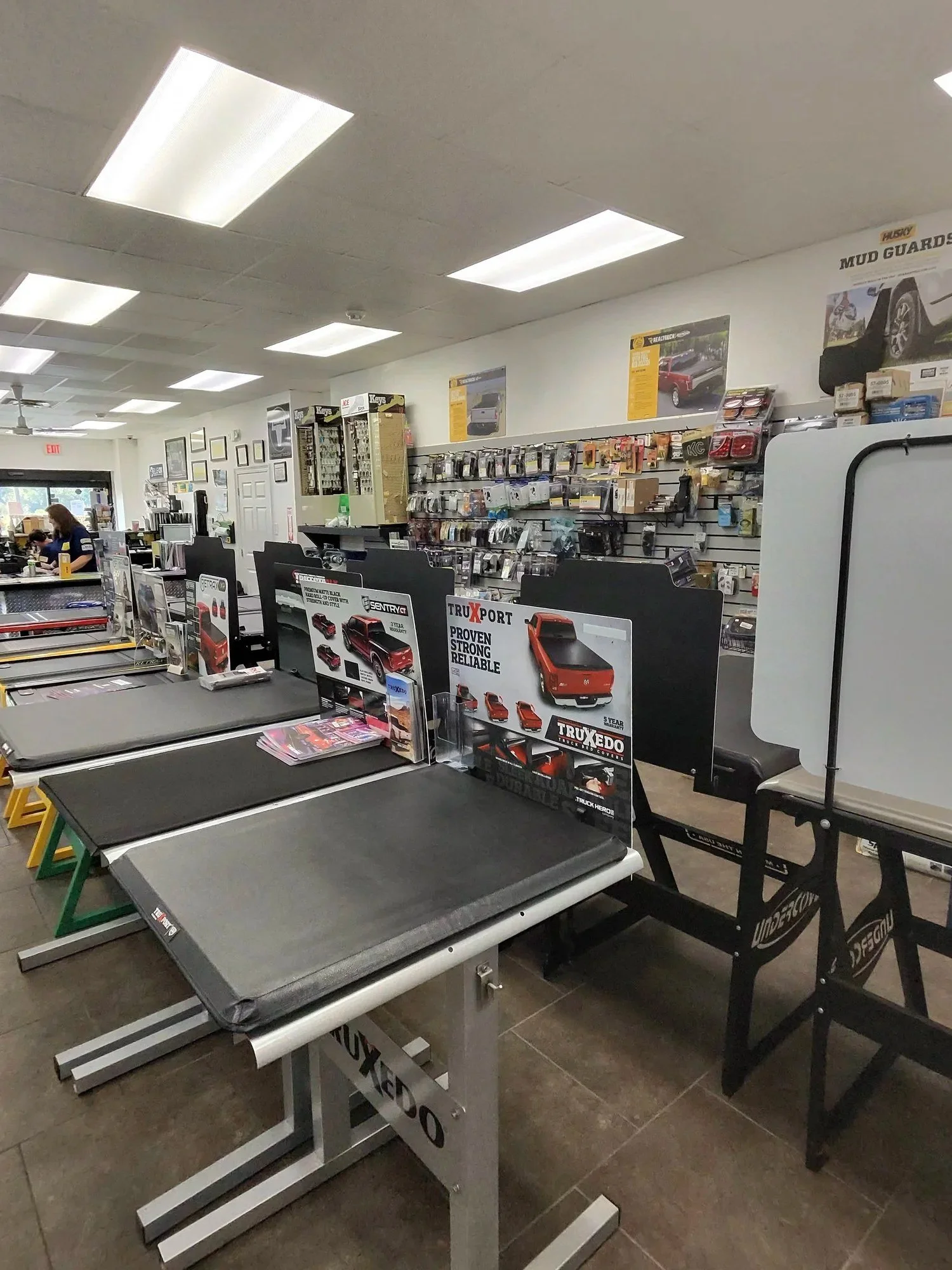 Tonneau bed covers on display at Tri-Parish Coatings and Accessories