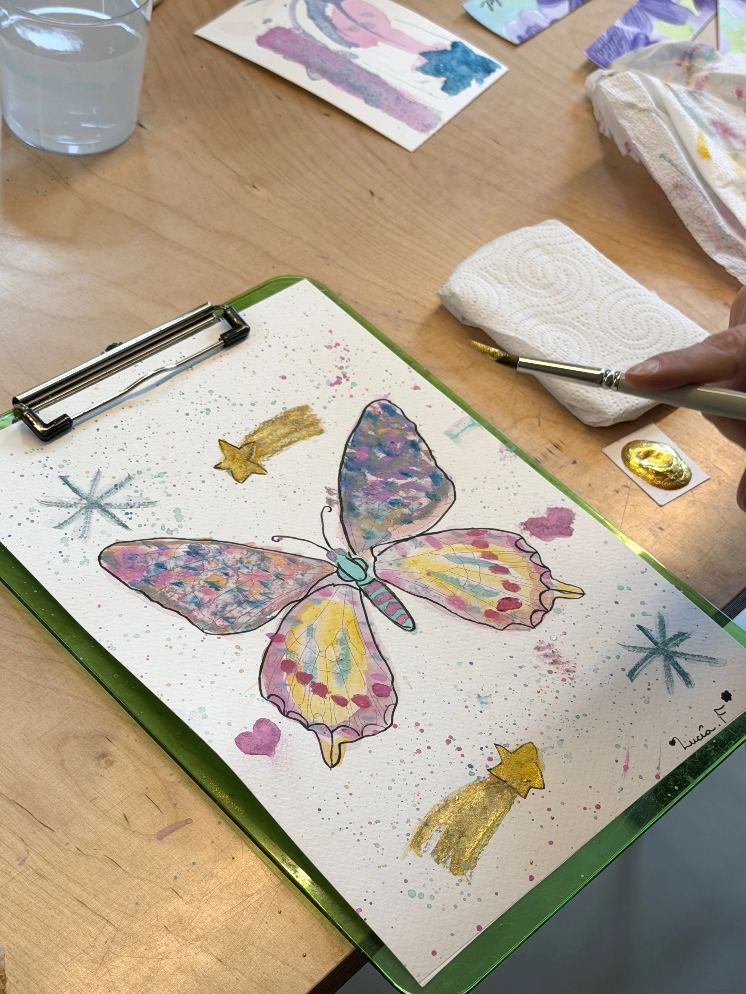 mariposa pintada por una alumna en el taller de acuarela