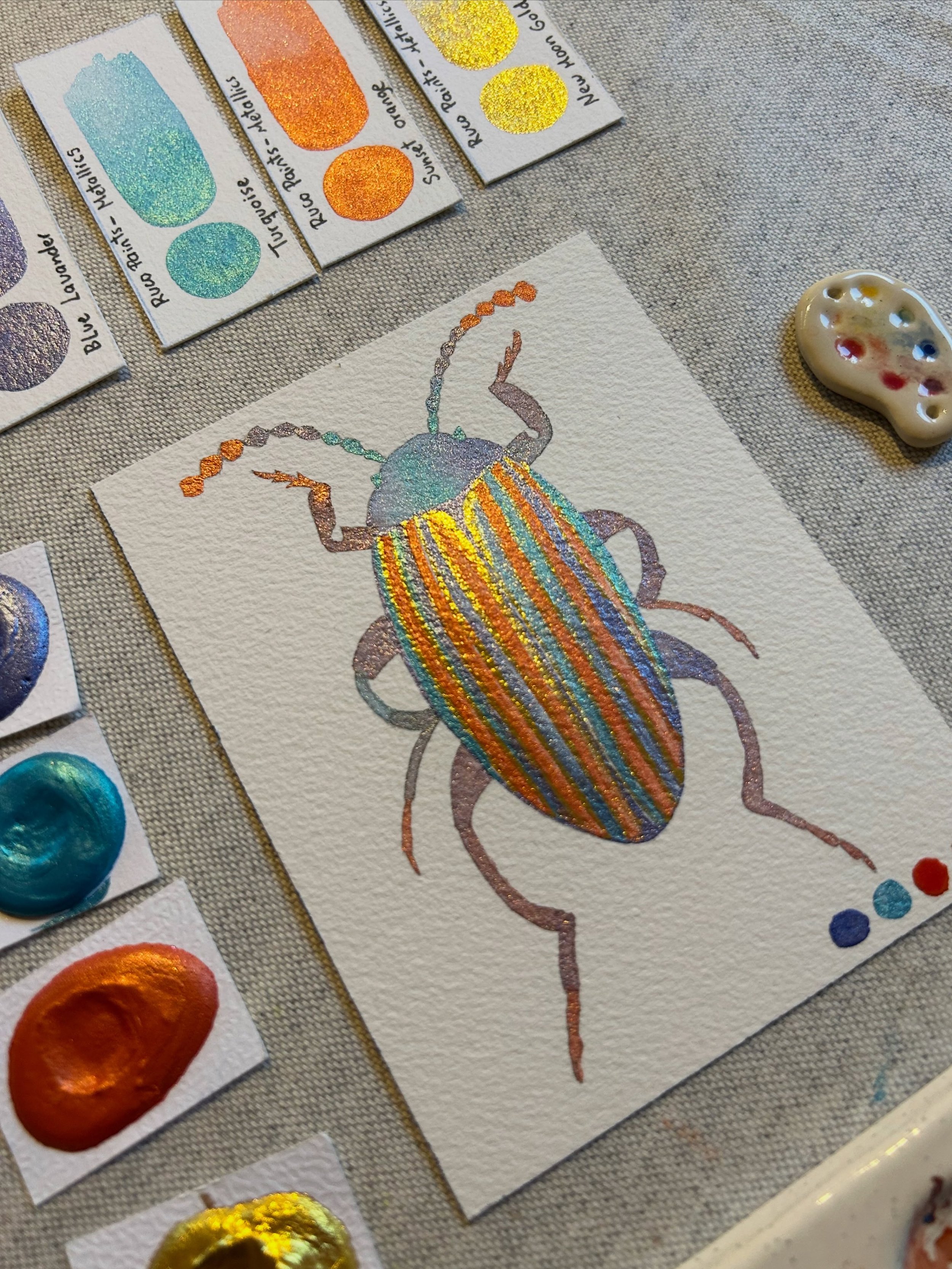 Escarabajo 🪲

Usando la teor&iacute;a de color y acuarelas metalizadas he pintado este insecto con una t&eacute;trada de colores. 

Y si esta palabra es nueva para ti, te invito a ver la serie completa en mi perfil &ldquo;Armon&iacute;as de color: c