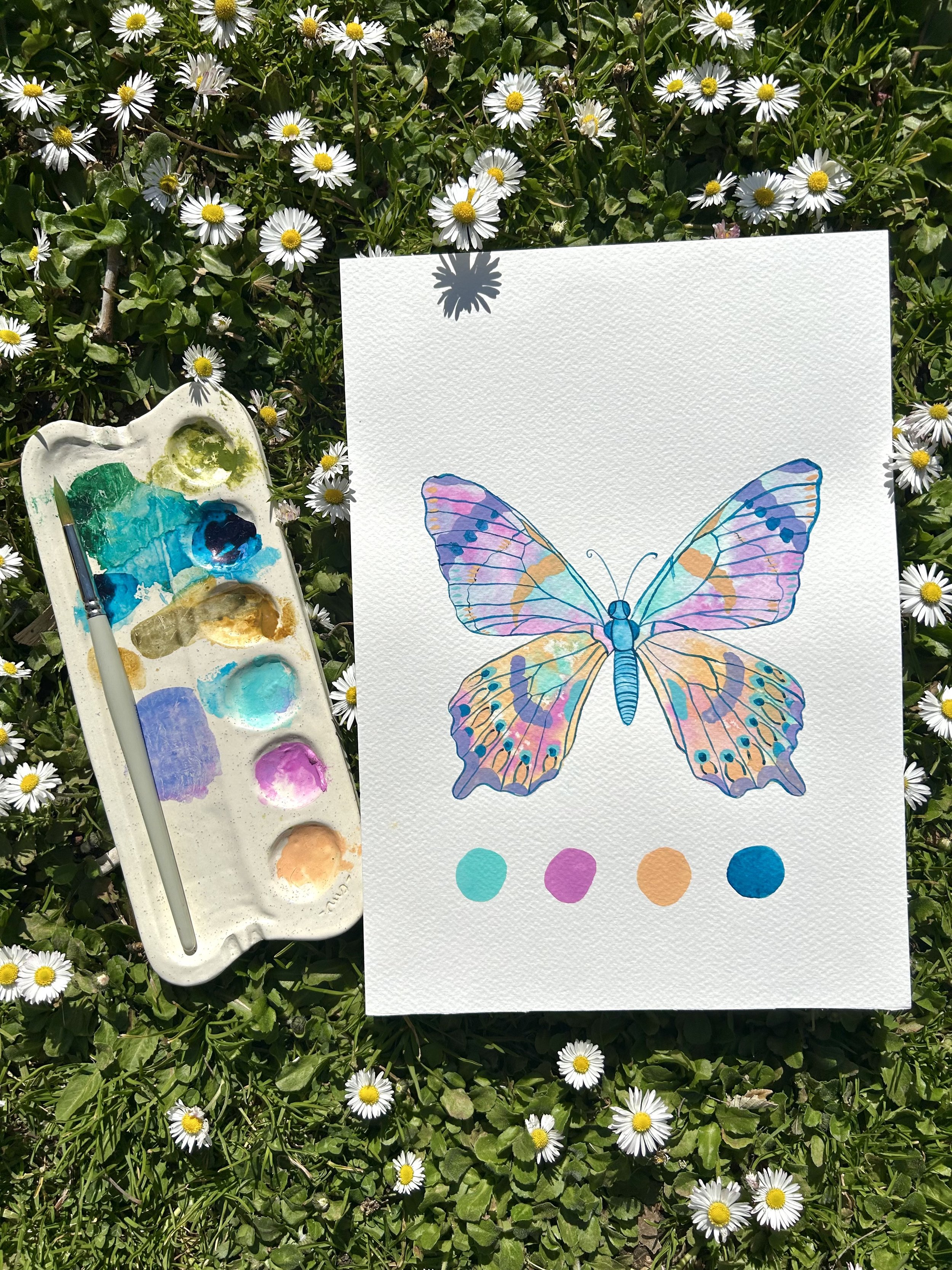 mariposa pintada con acuarela en un taller de carlissima