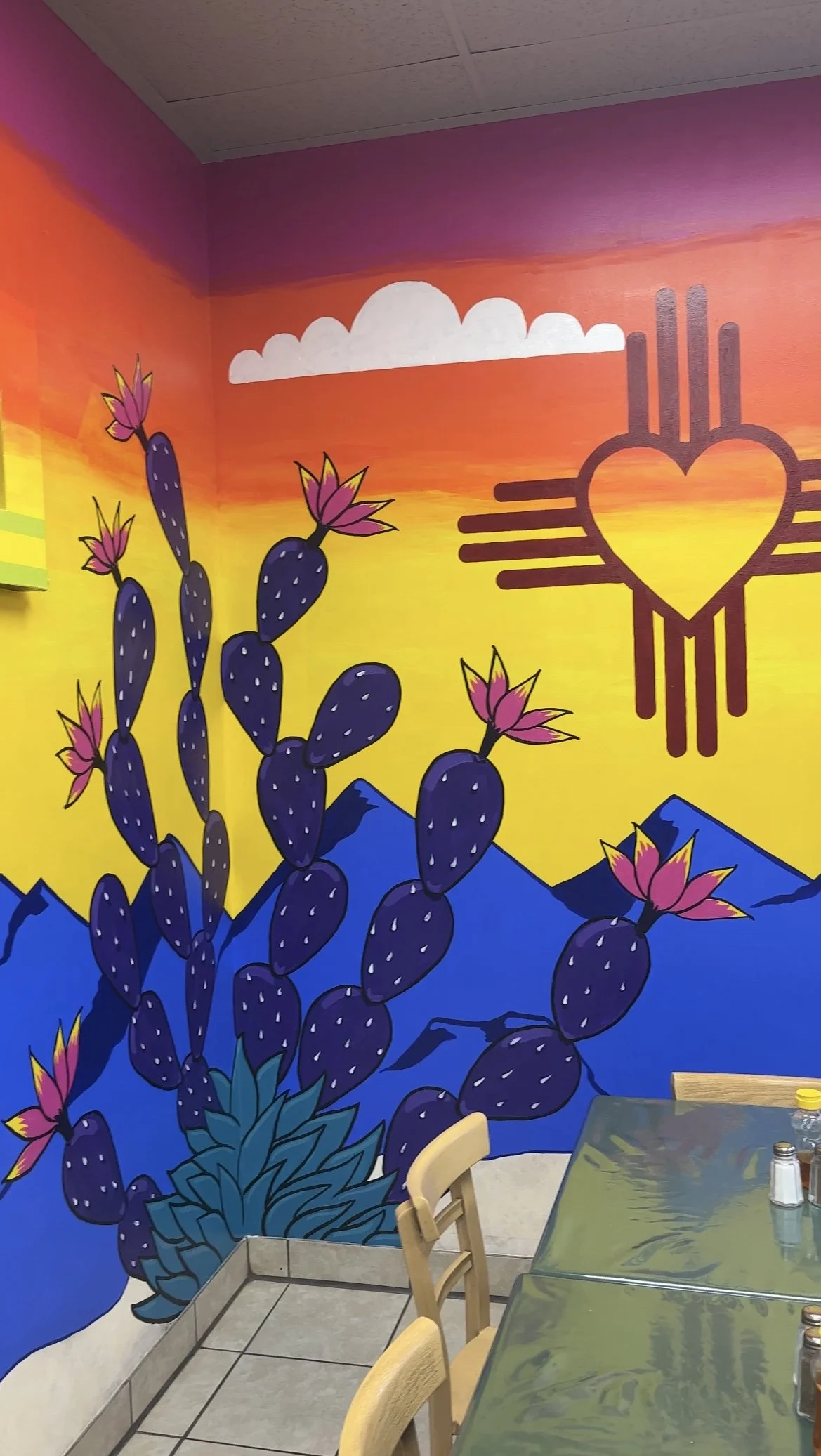 Mural bright bold New Mexico restaurant sacred geometry