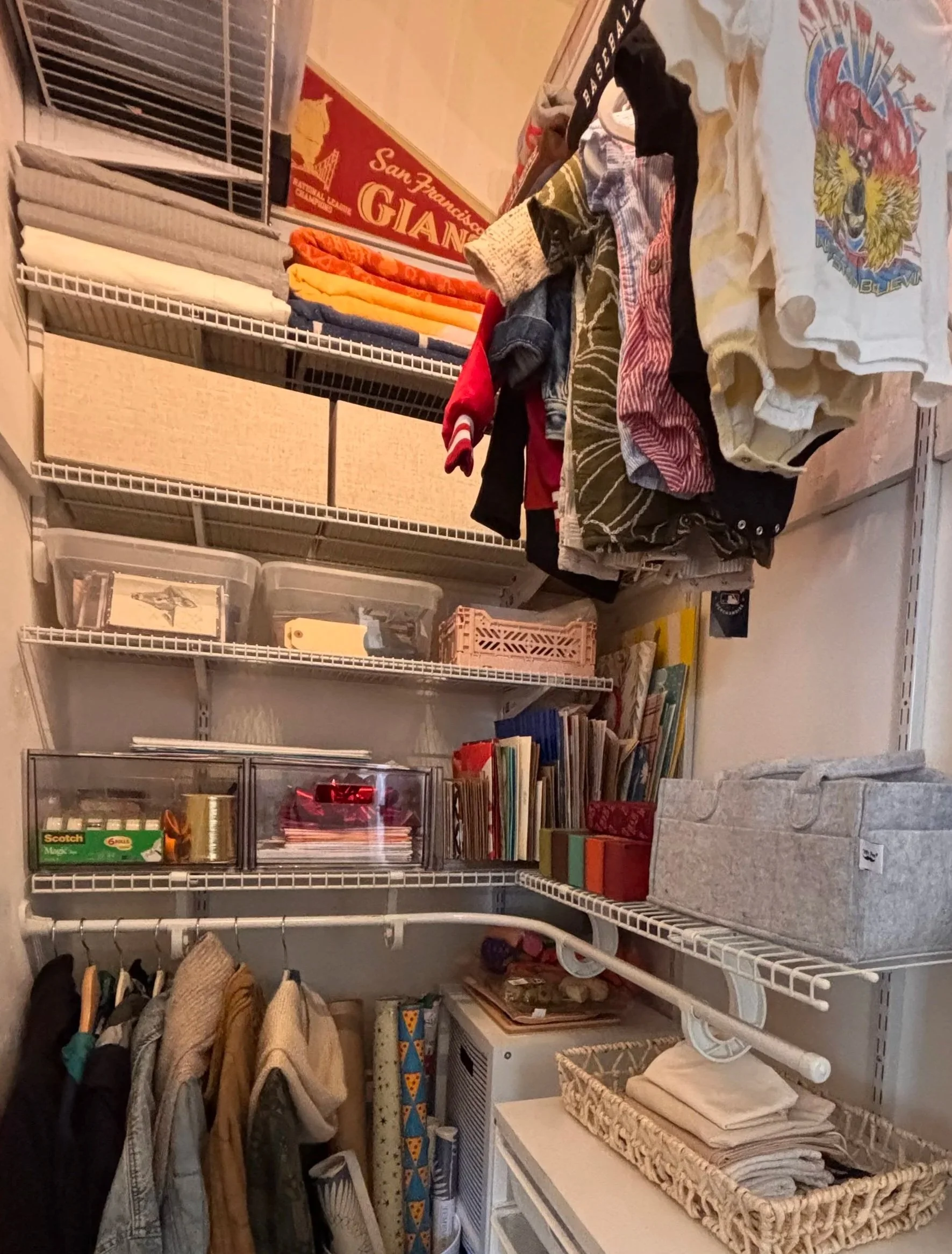 Multi-purpose closet. Zoned closet organization. Closet organized by Adrian Jacob Creative. San Francisco Home Organizer