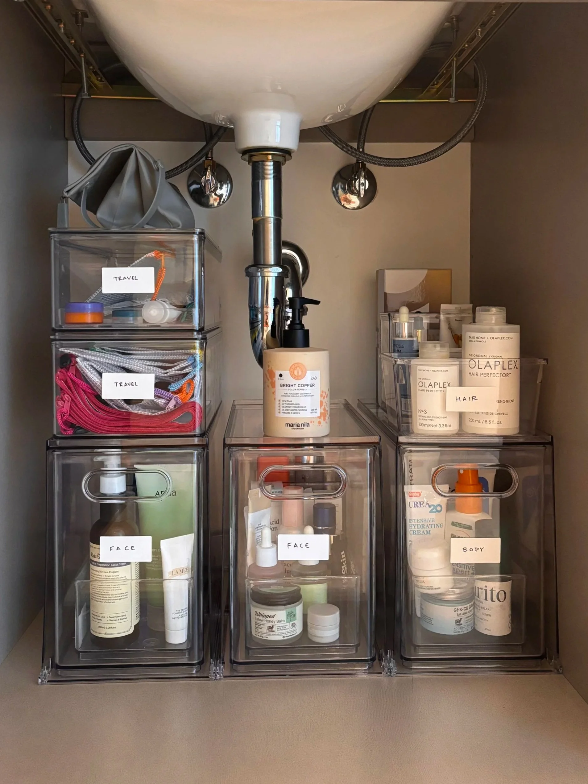 Bathroom organized by Adrian Jacob Creative. San Francisco Home Organizer. Under sink storage solutions.